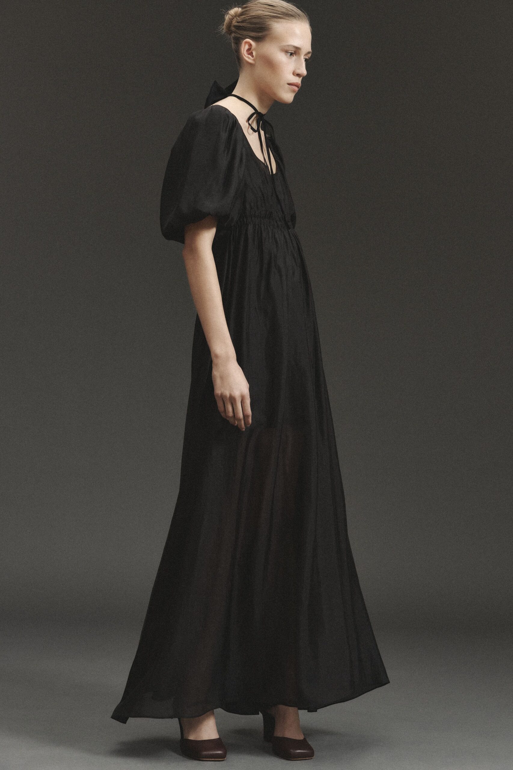 black chiffon sleeveless v-neck relaxed flowing sheer gown