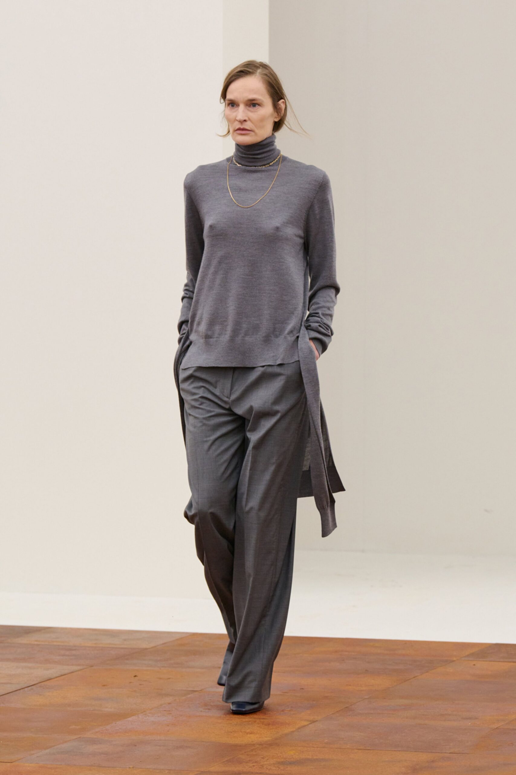 gray relaxed top with tailored pants