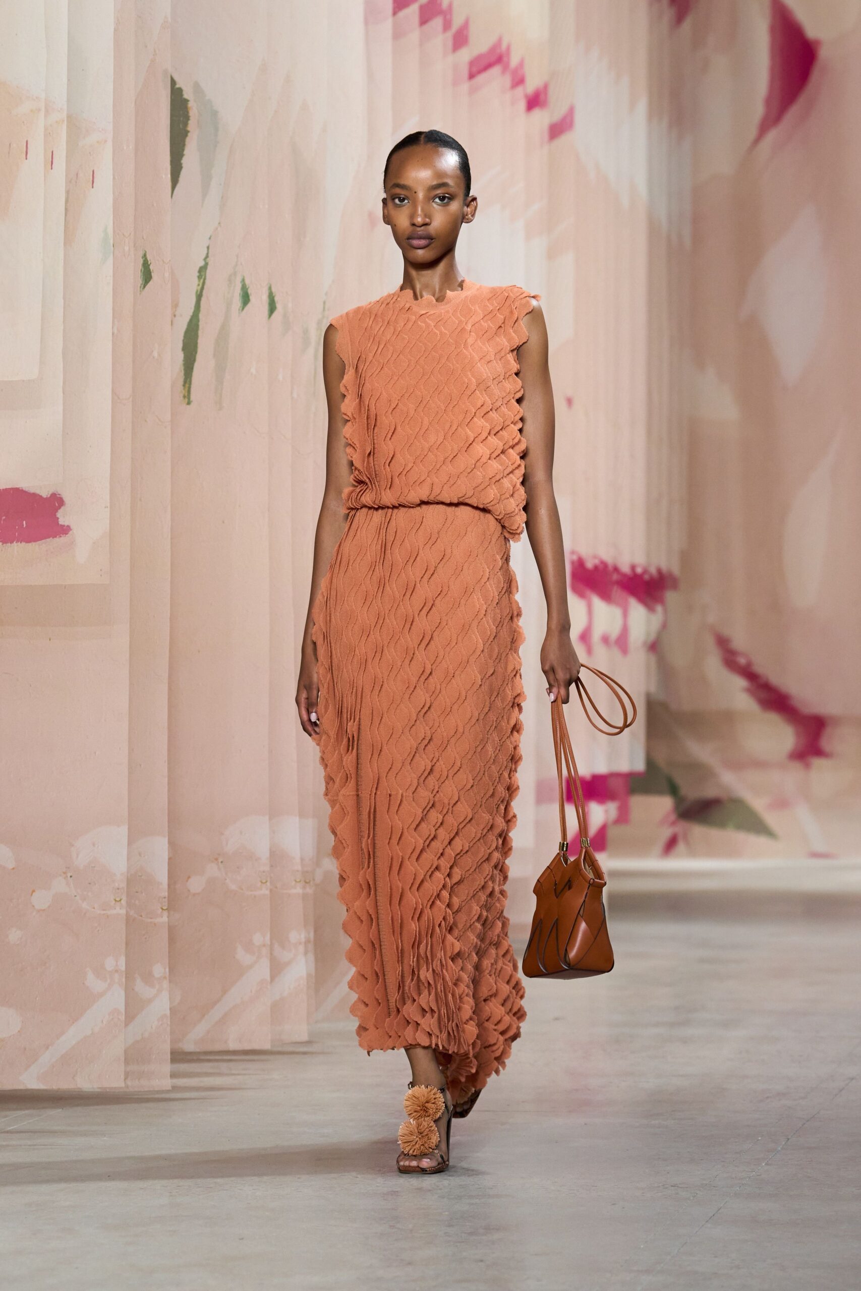 orange silk sleeveless high-neck fitted pleated midi dress