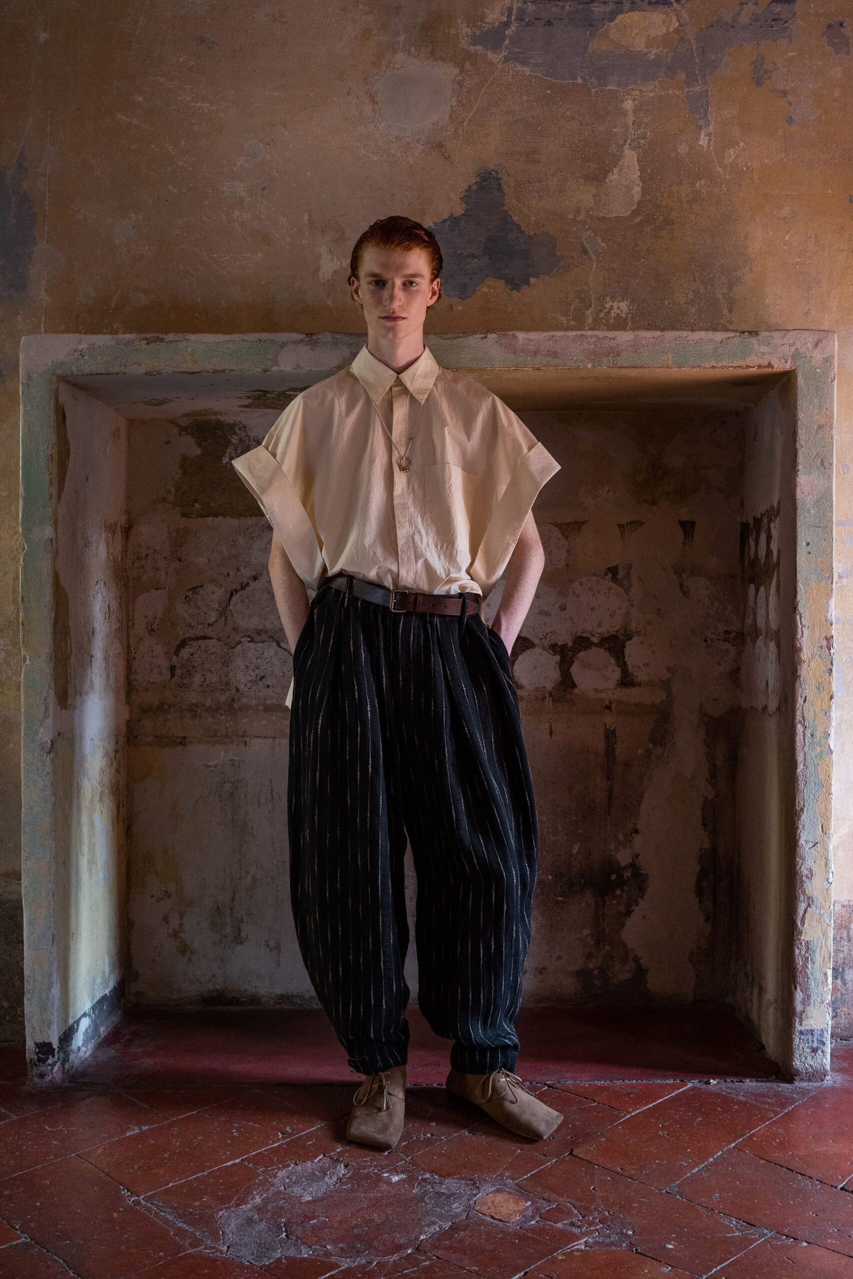 white cotton short-sleeve collared relaxed pleated shirt