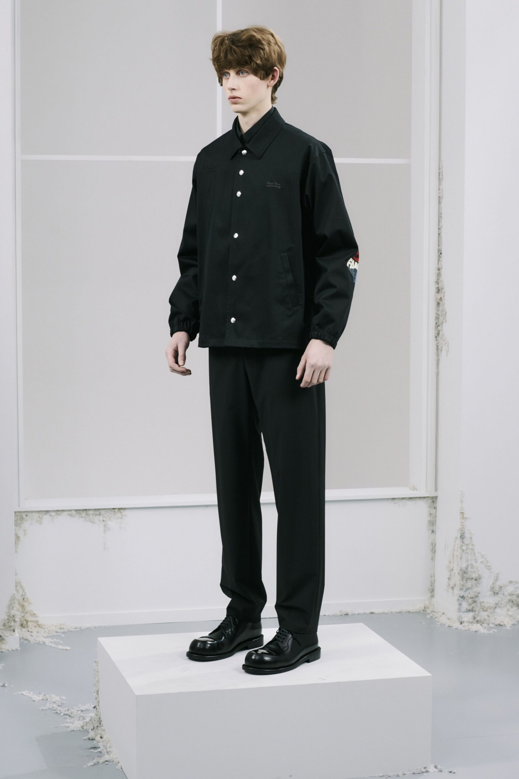 black relaxed jacket and tailored pants
