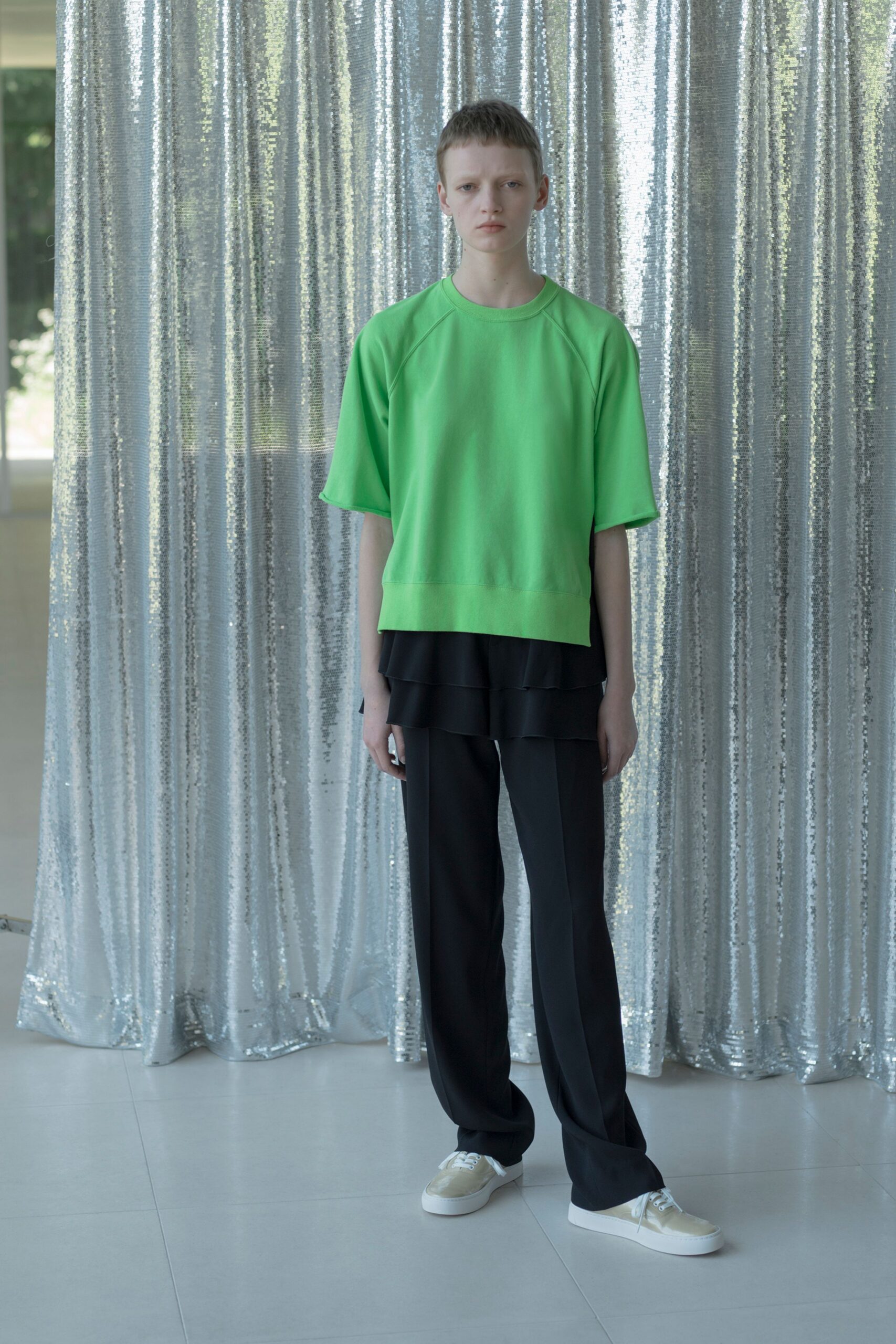 green relaxed top black tailored pants