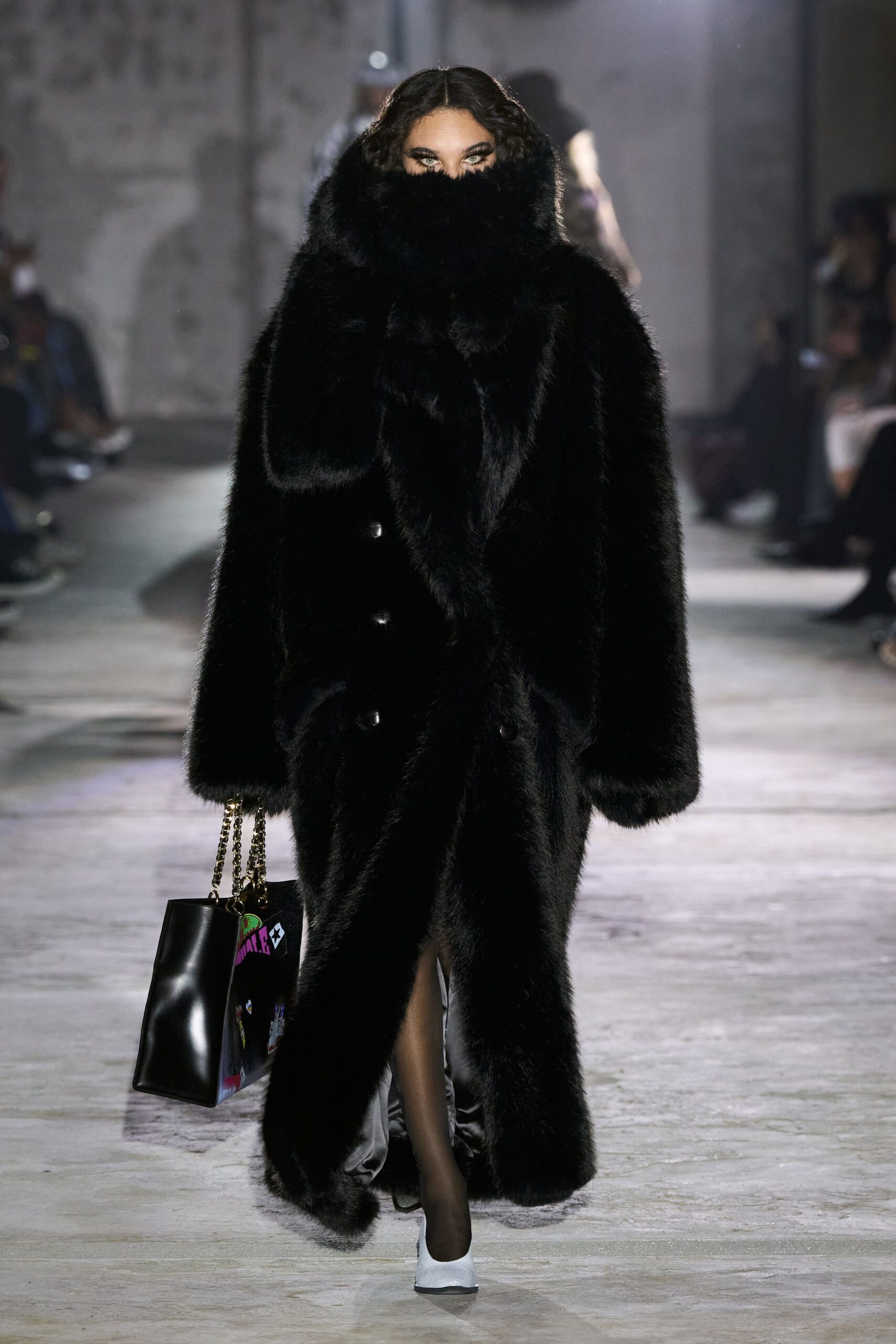 black faux-fur coat with silk dress