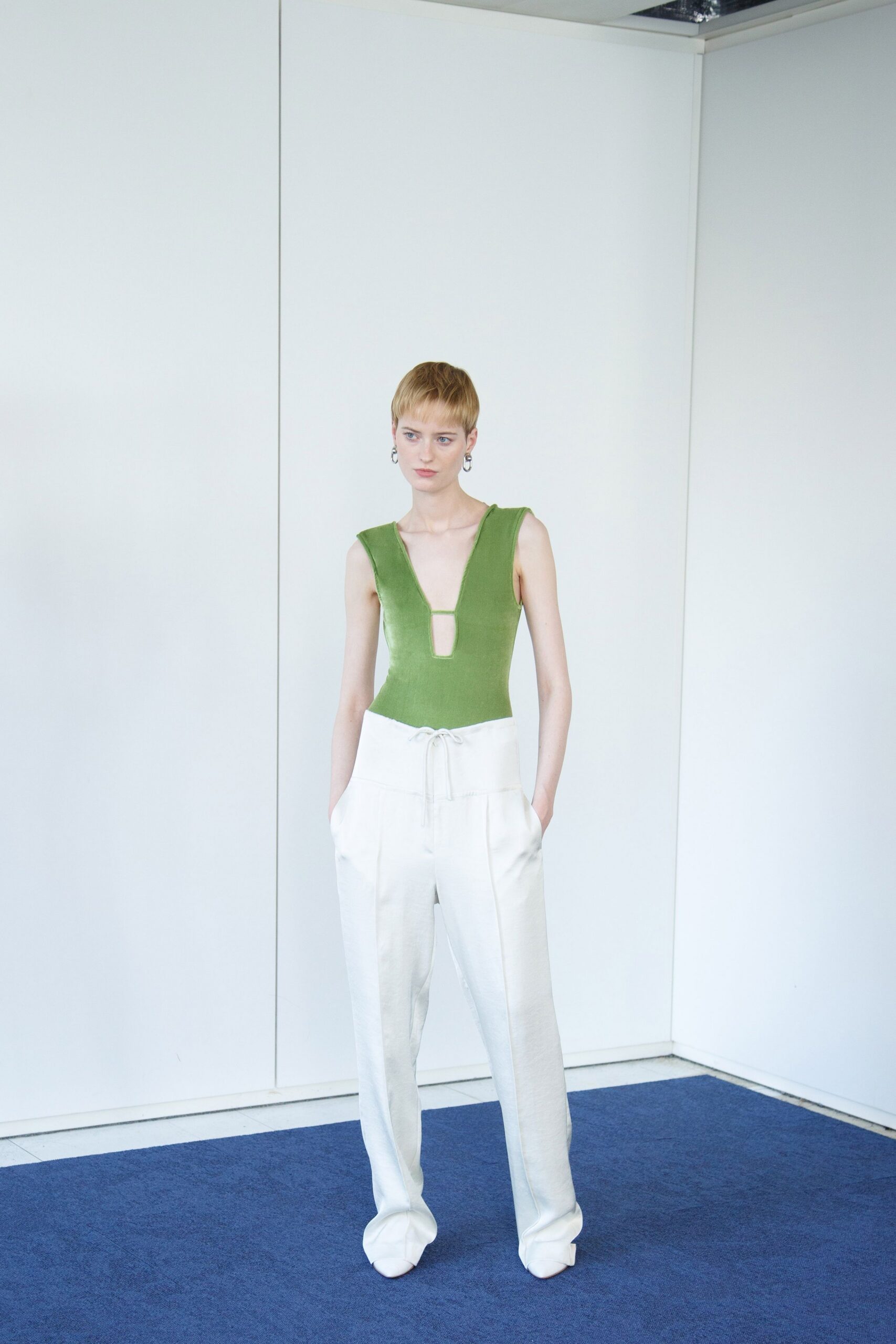 green cotton sleeveless v-neck fitted bodysuit