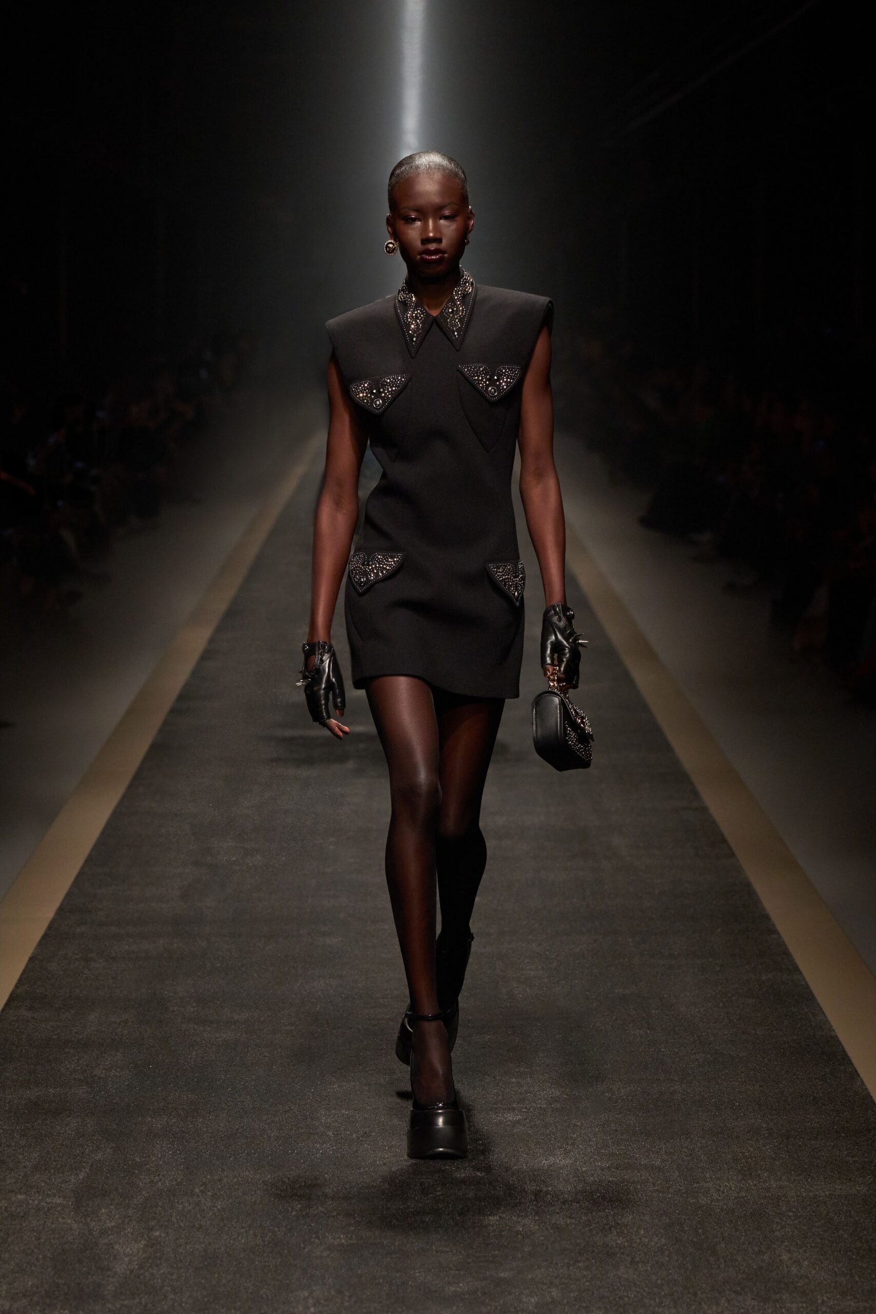 black fitted mini-dress with gloves