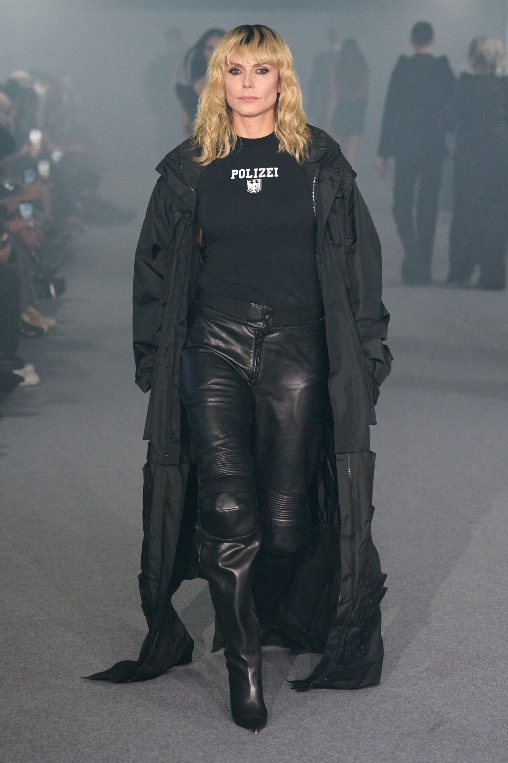 black coat and leather pants