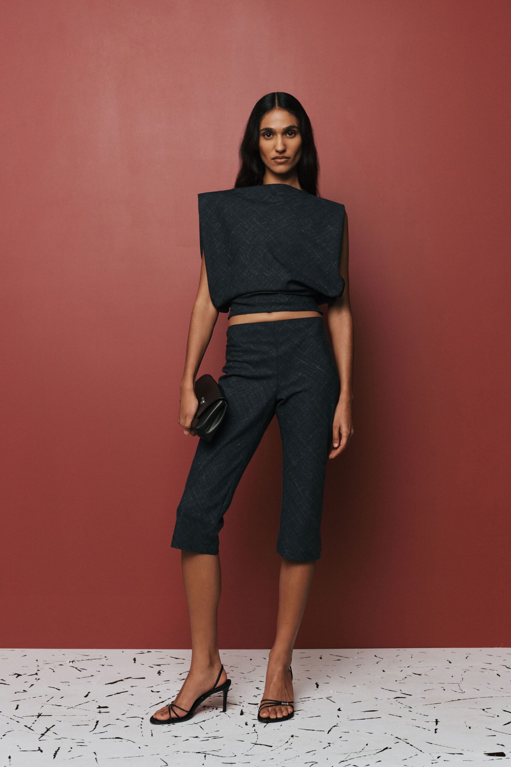 black denim sleeveless high-neck fitted structured cropped top