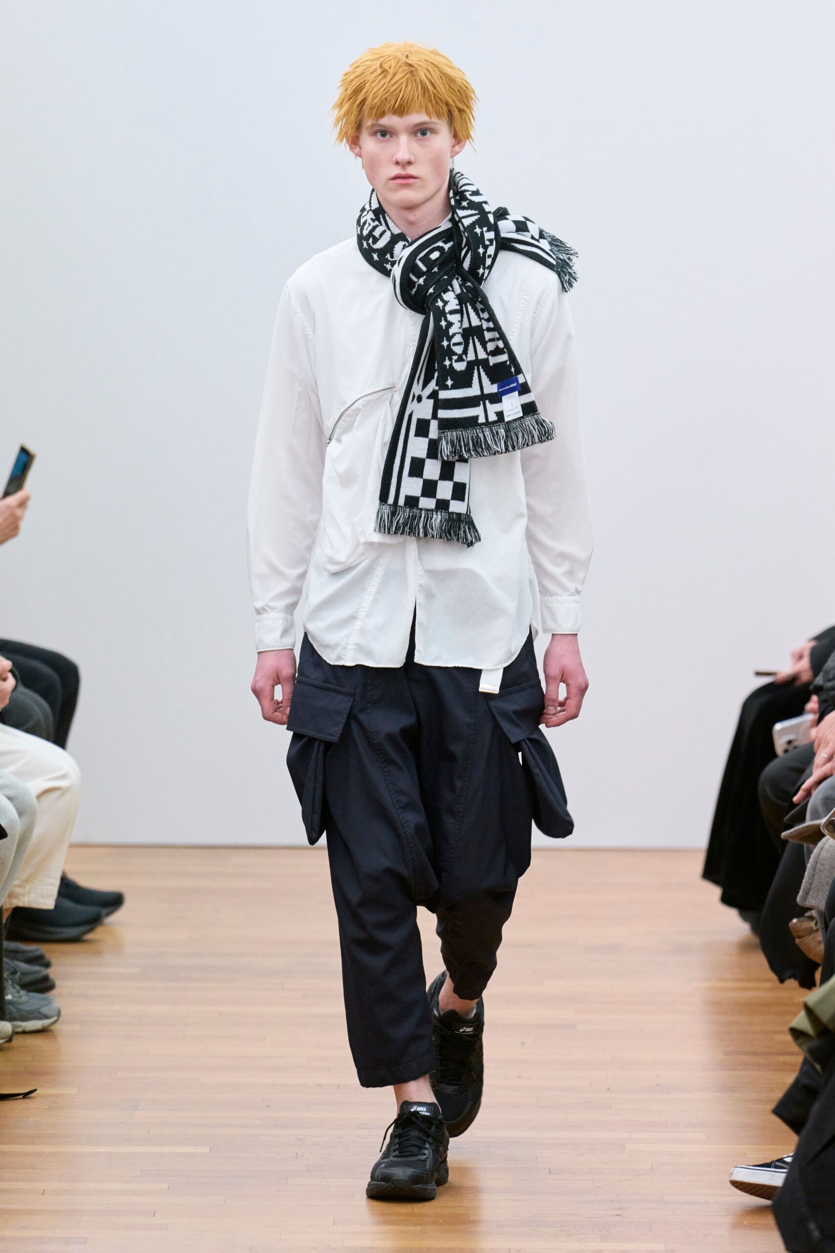 white shirt navy cargo pants