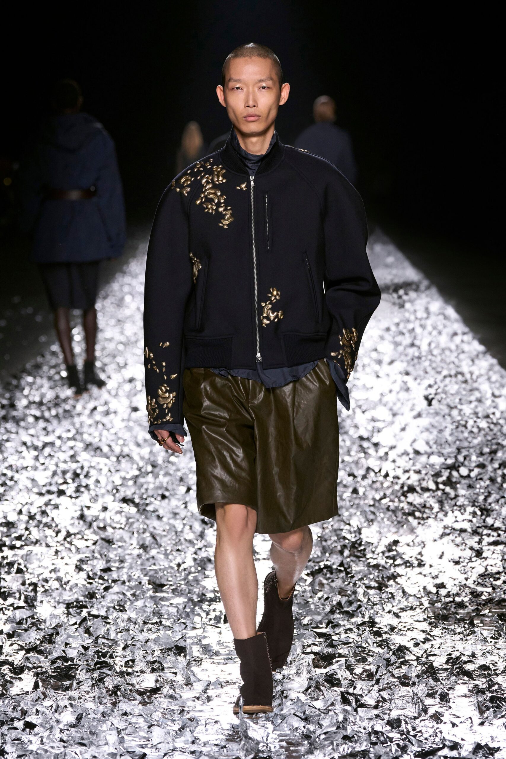 black embroidered jacket brown leather skirt