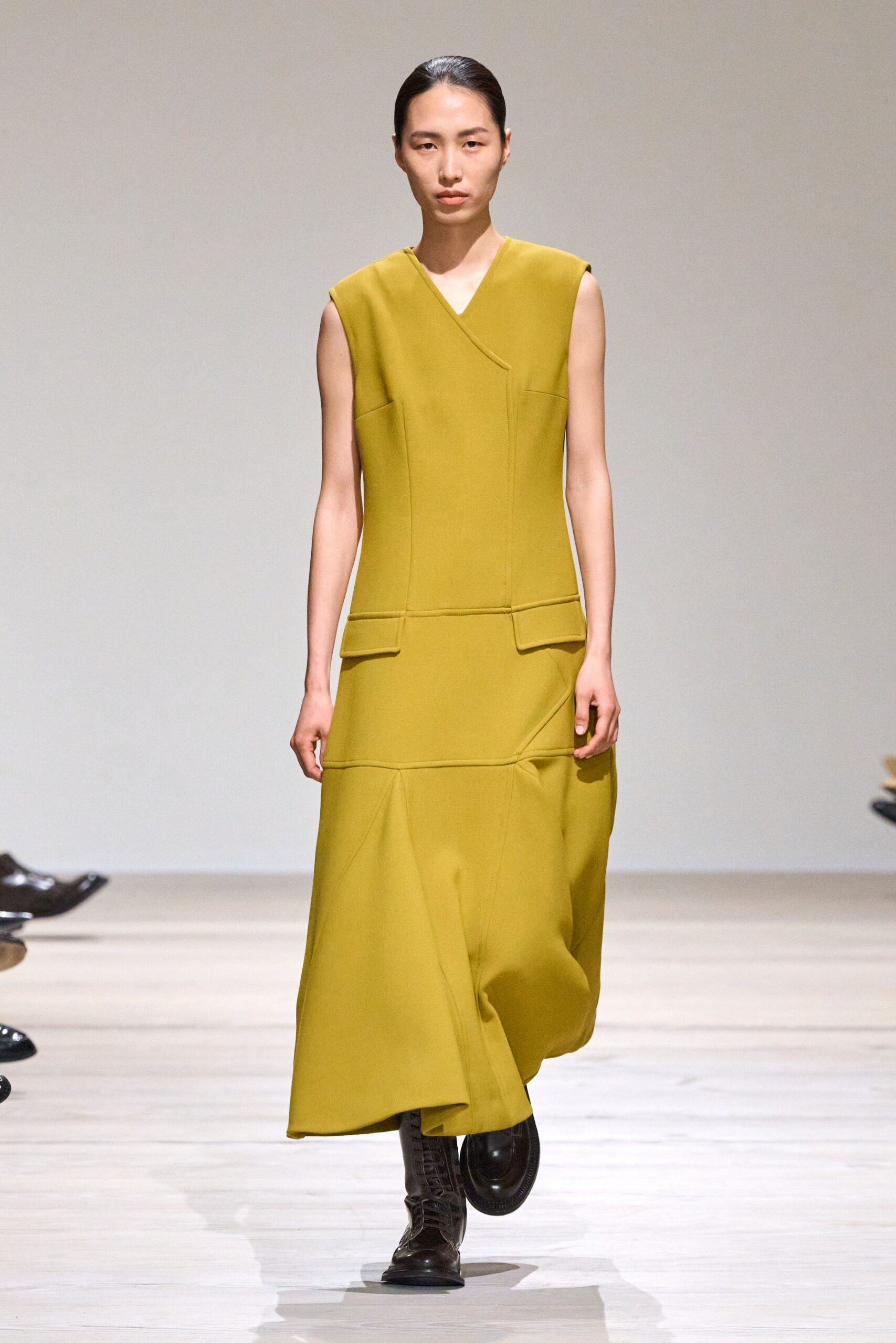yellow cotton sleeveless v-neck fitted pockets midi dress