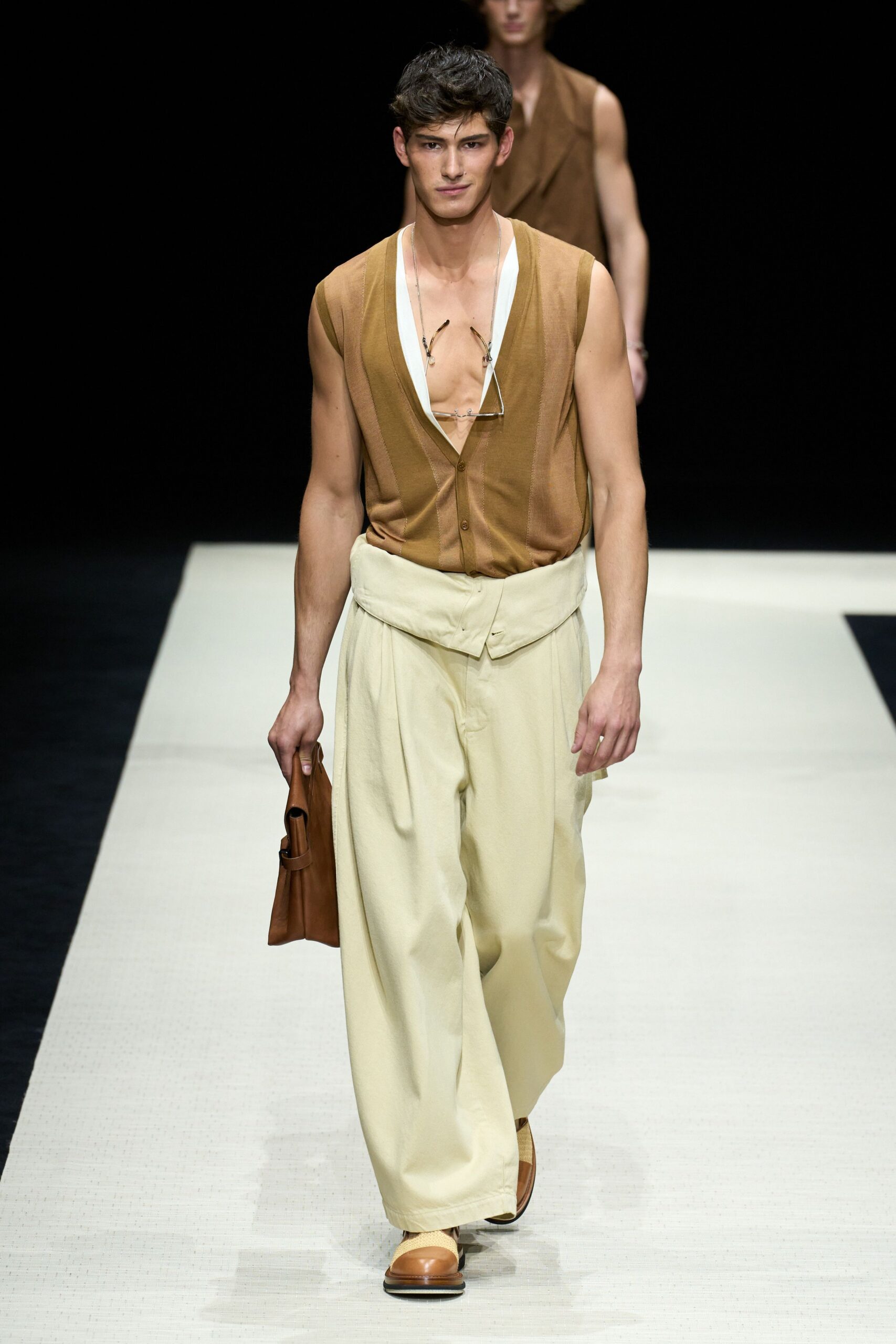 brown sleeveless top with beige pants
