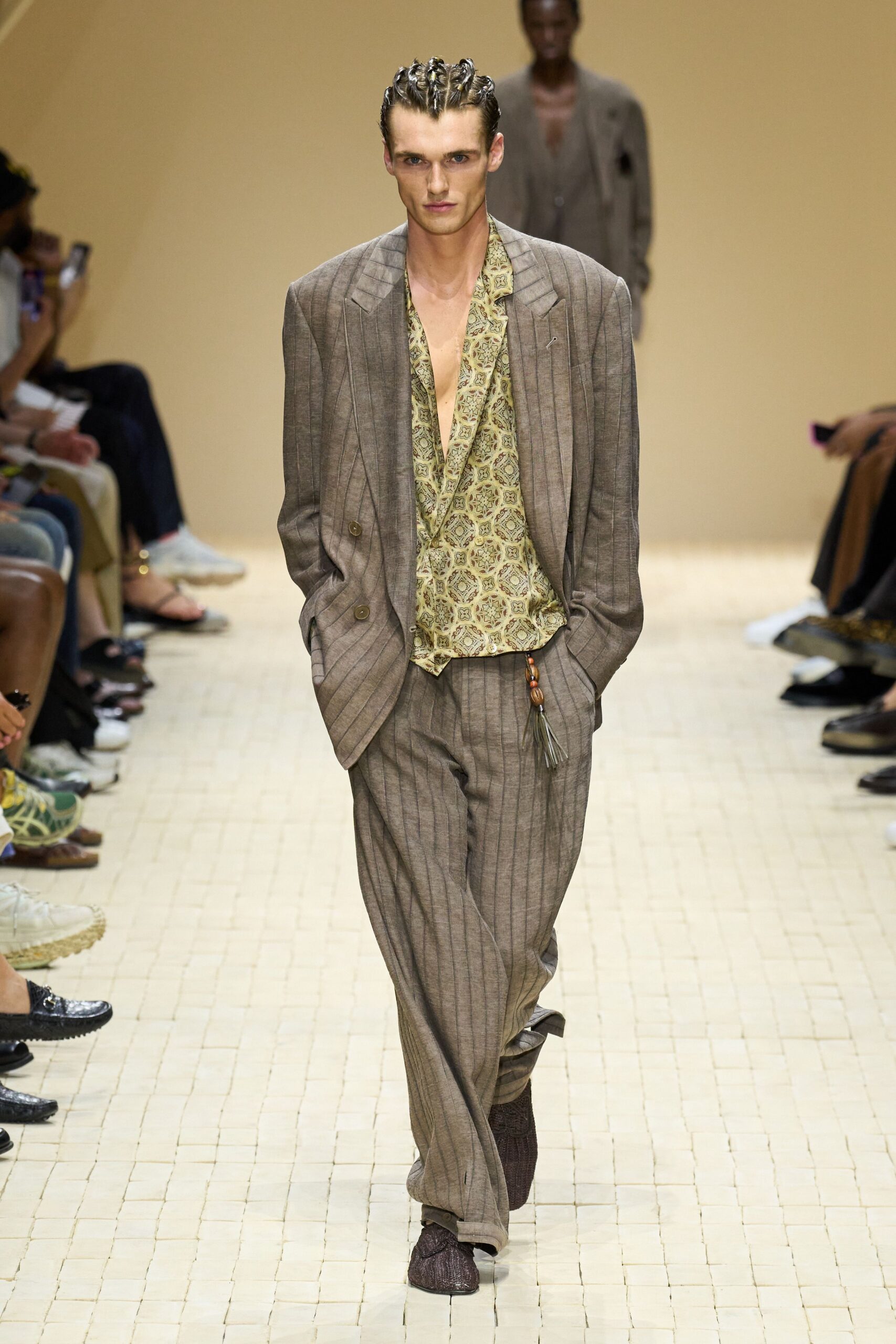 brown tailored suit with printed shirt