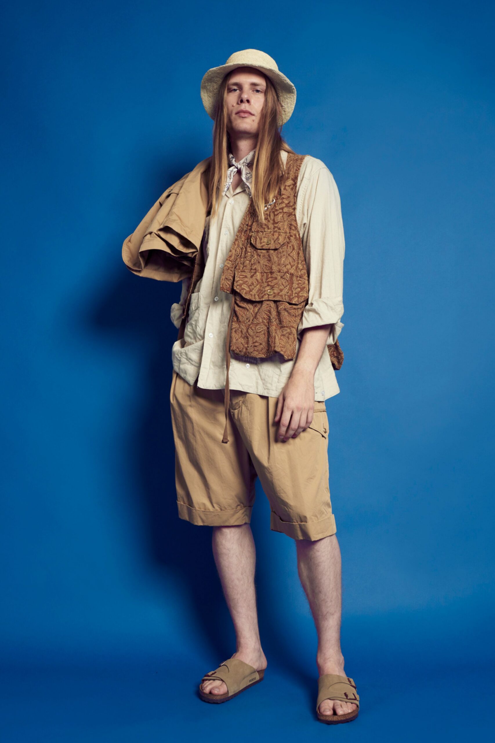 beige cotton shirt with brown vest