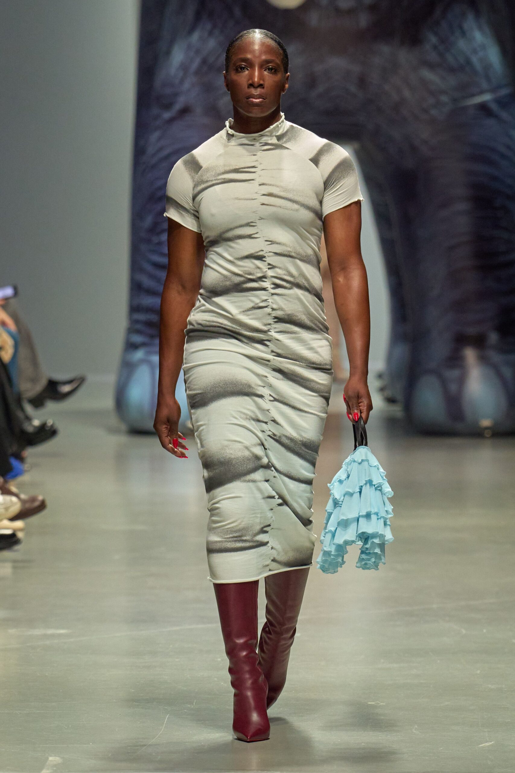 blue ruffled bag