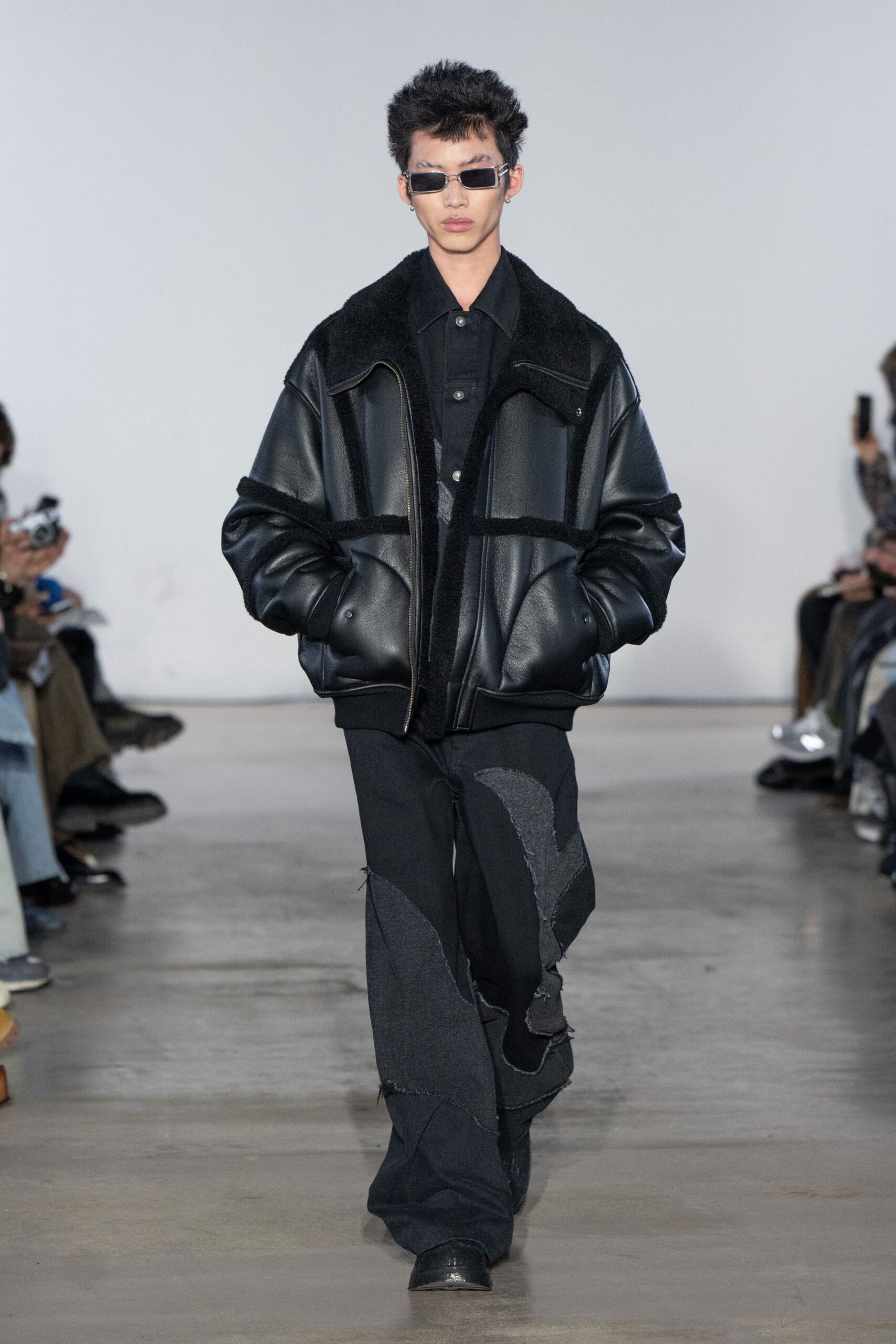 black leather long-sleeve collared oversized zippered jacket