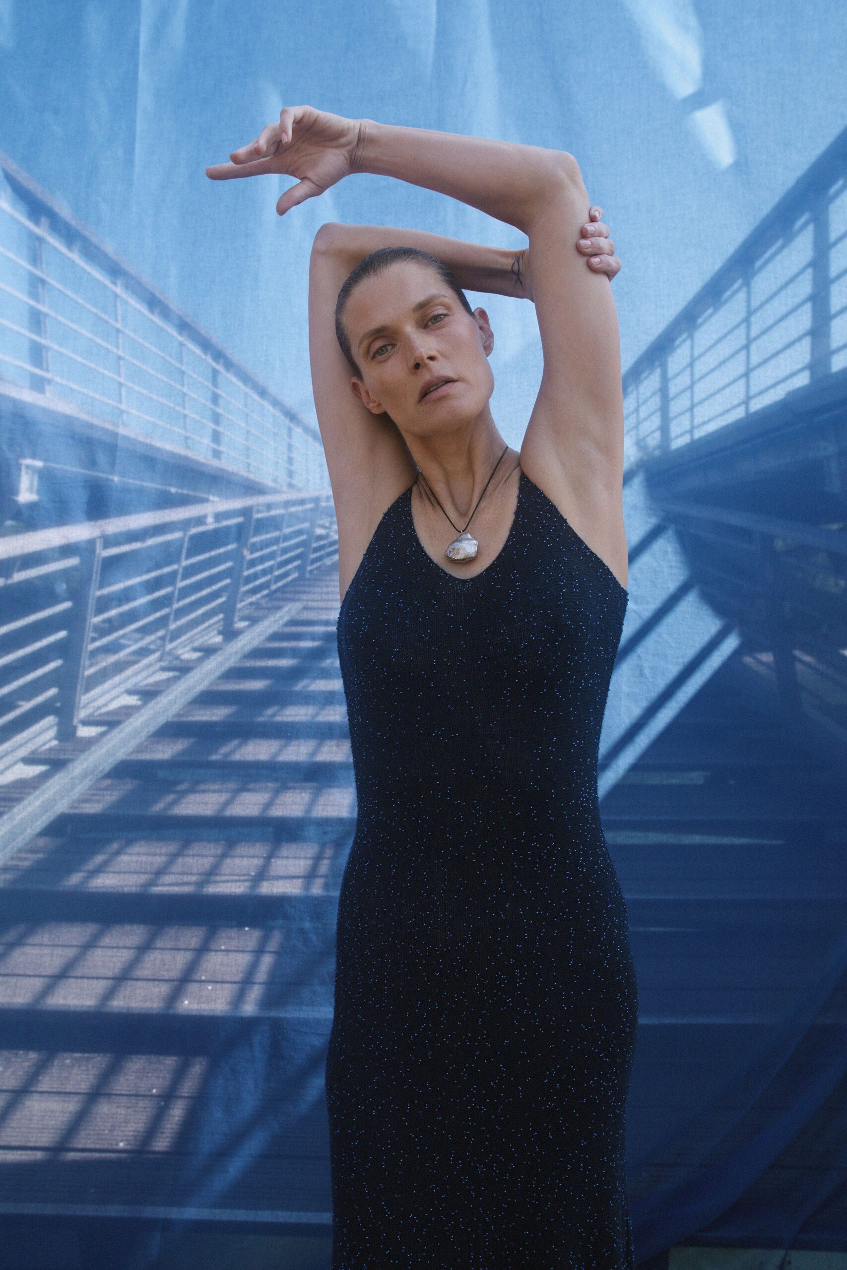 black fitted sleeveless dress
