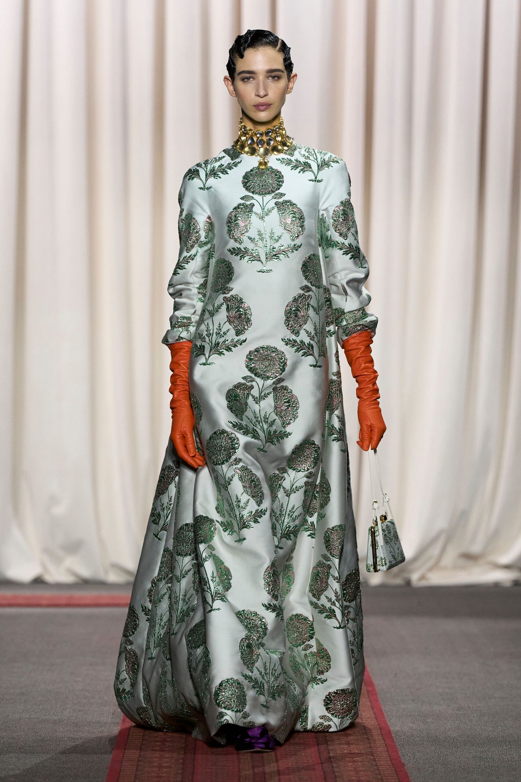 green silk long-sleeve high-neck fitted embroidered flared gown