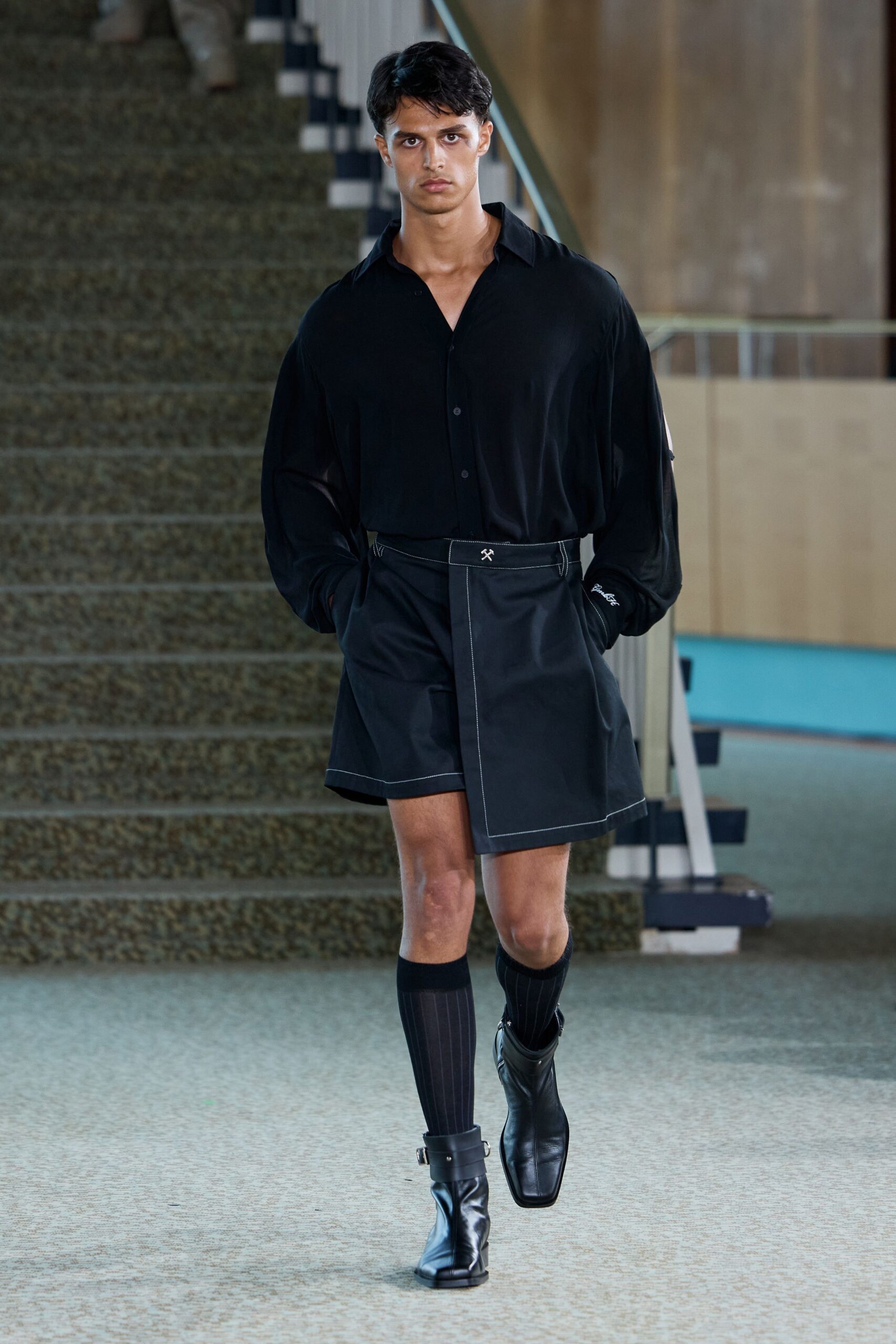 black relaxed shirt and fitted skirt