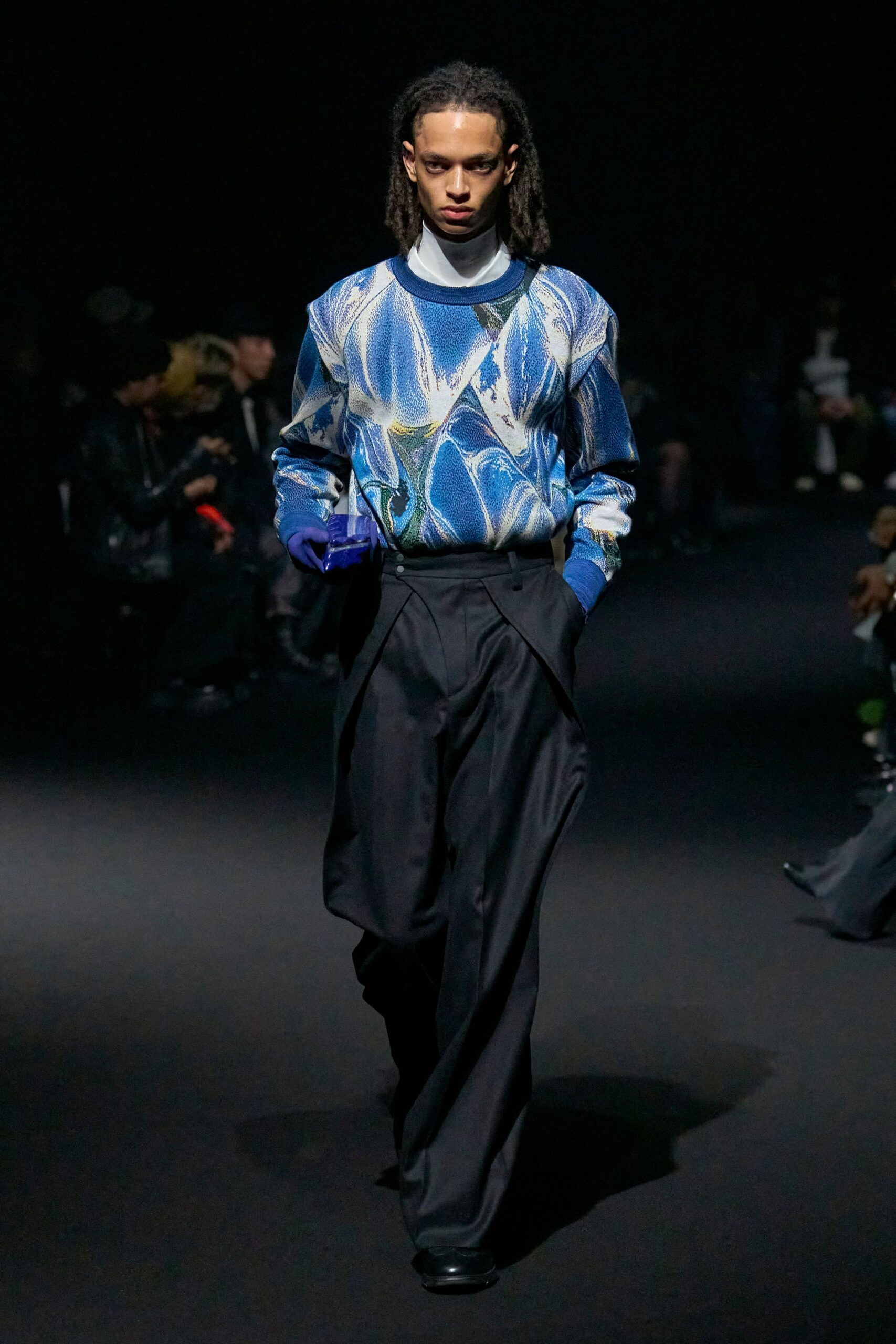 blue printed top with black pants