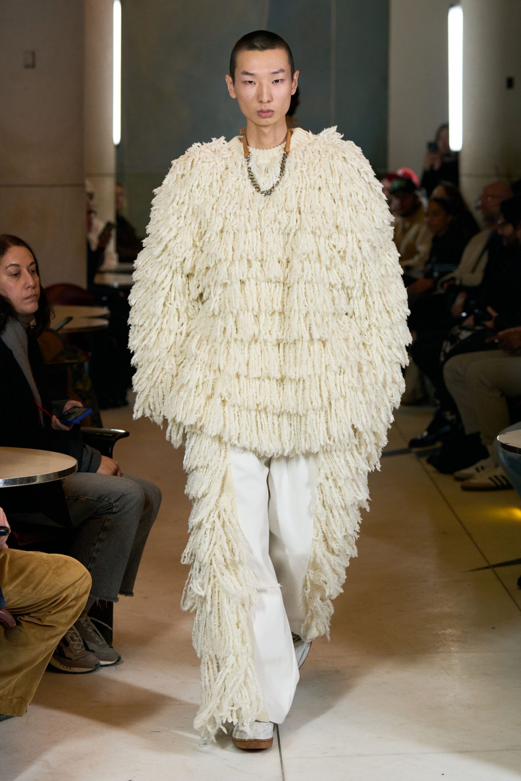 oversized white fringed top with relaxed pants