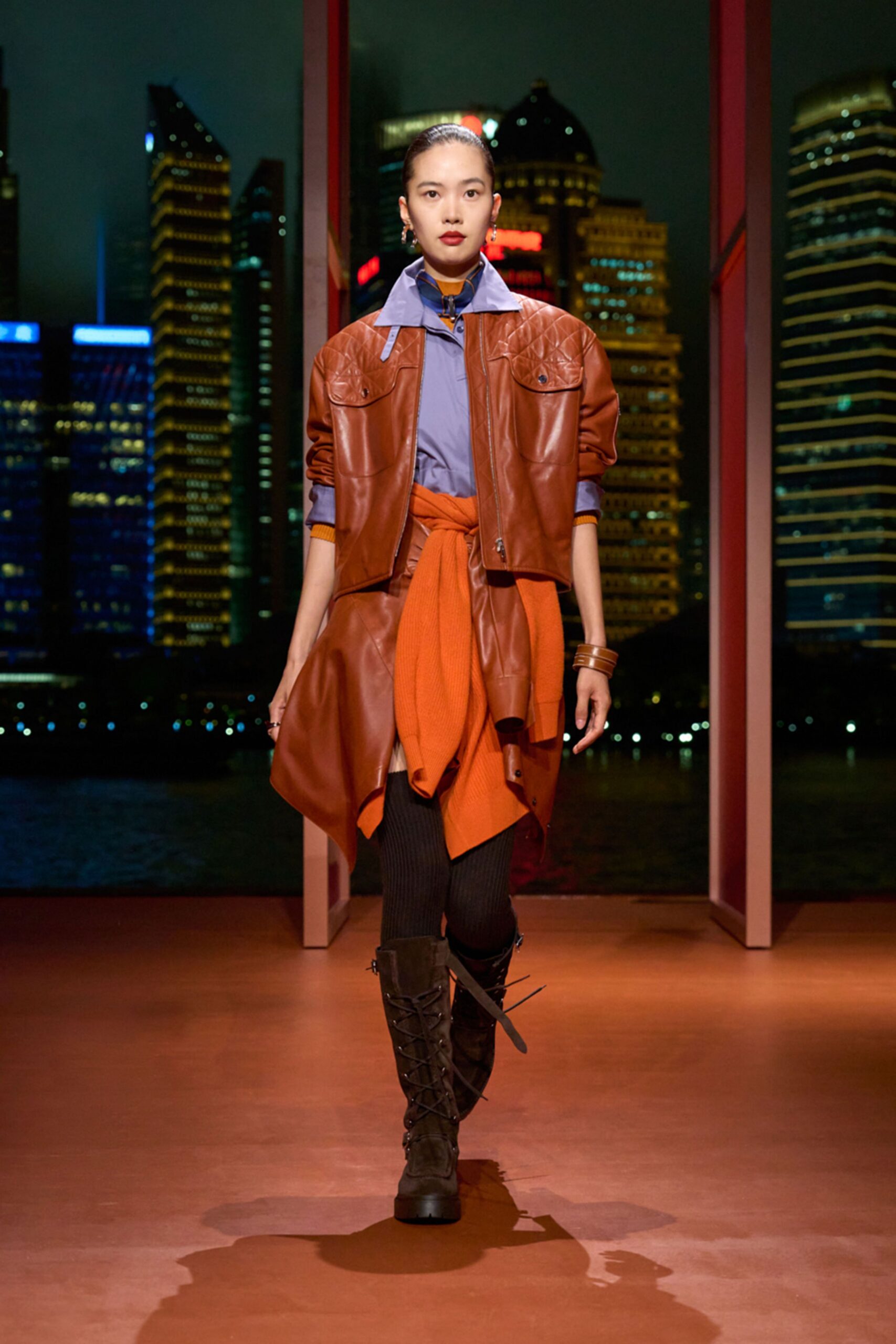 brown leather jacket with blue shirt
