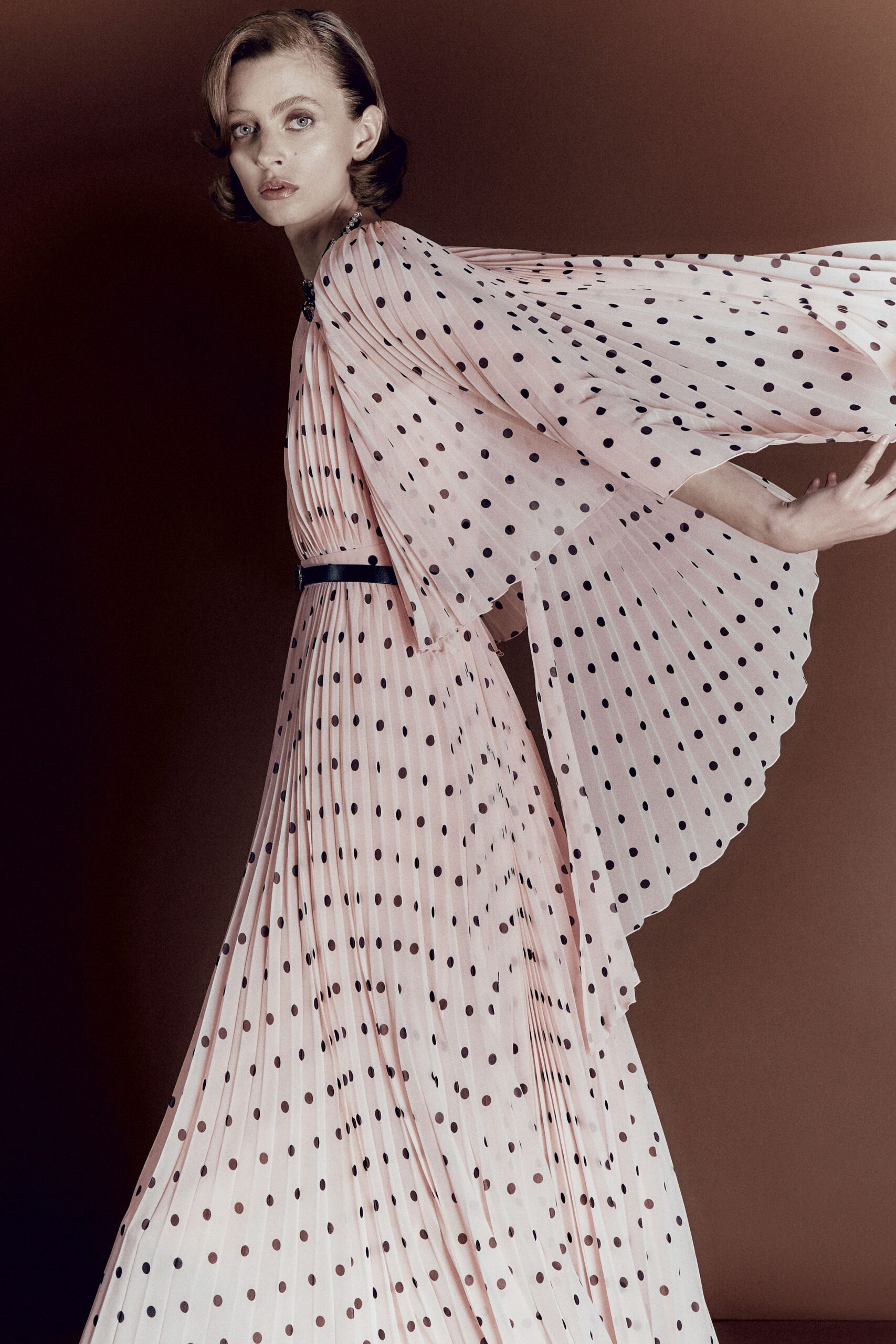 pink polka-dot pleated gown