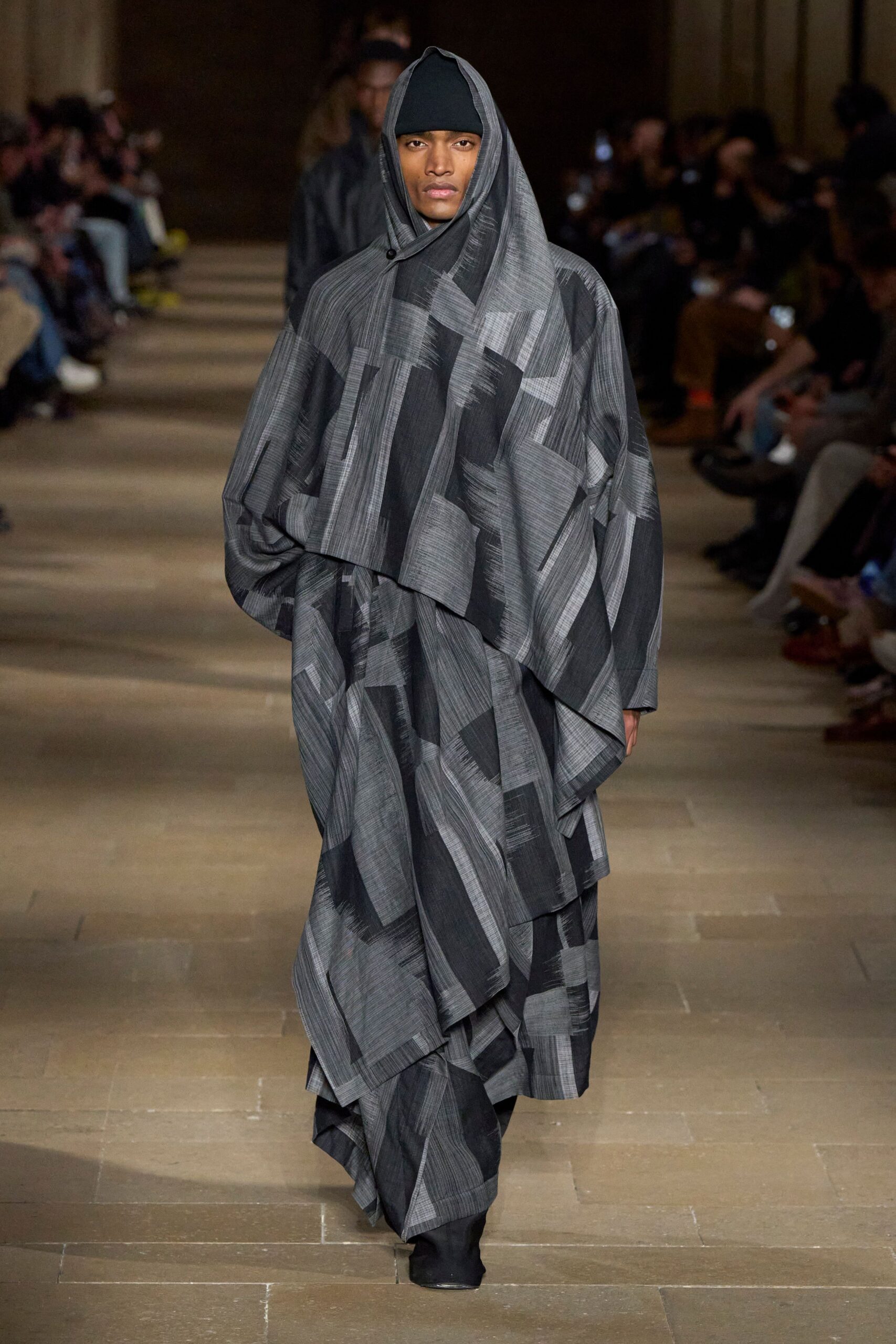 black gray layered cape and pants