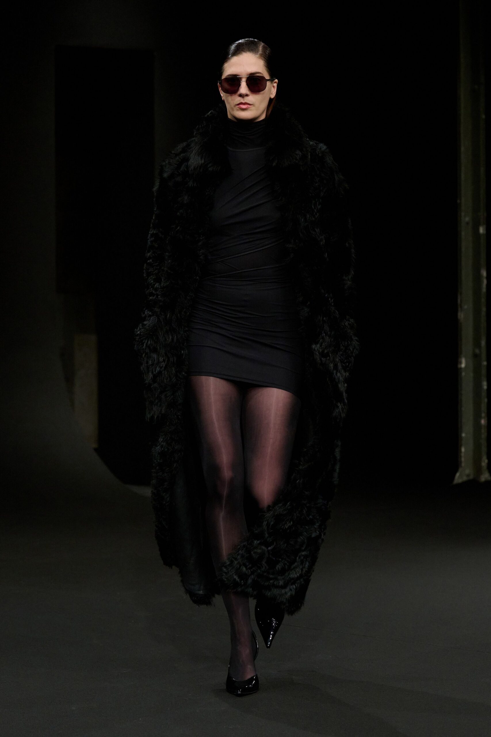 black mini dress with faux-fur coat