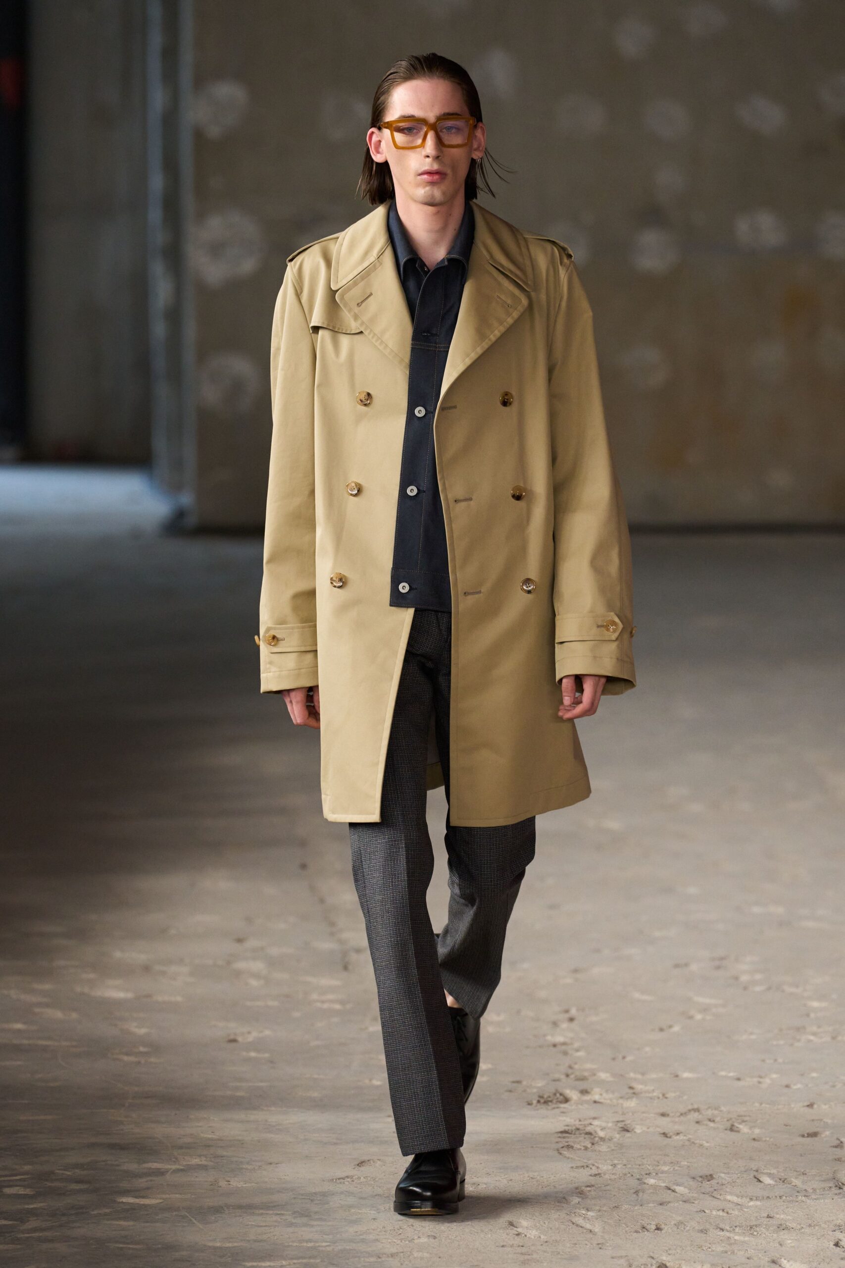 beige coat black shirt gray pants