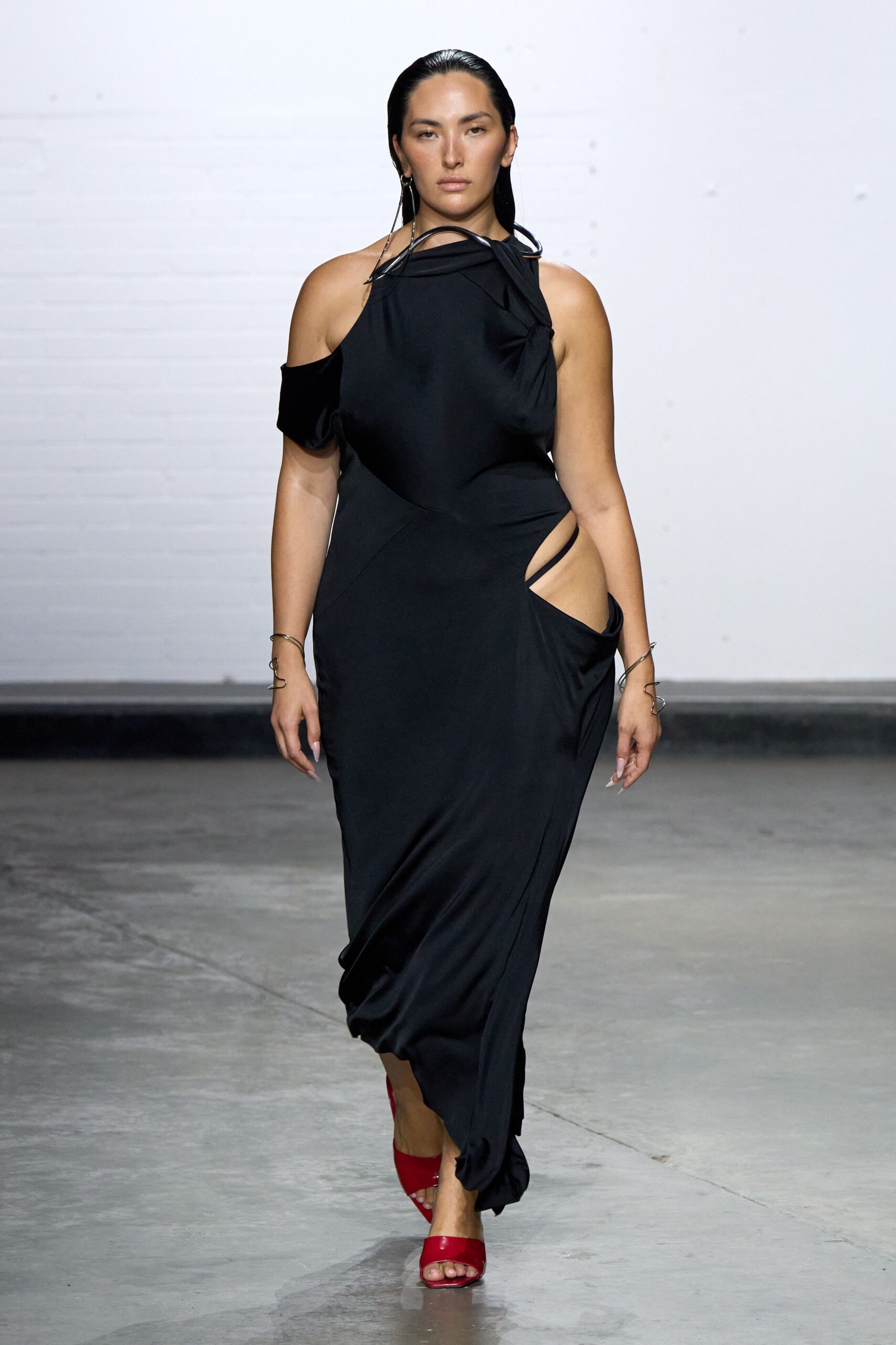 black cutout maxi dress with red shoes