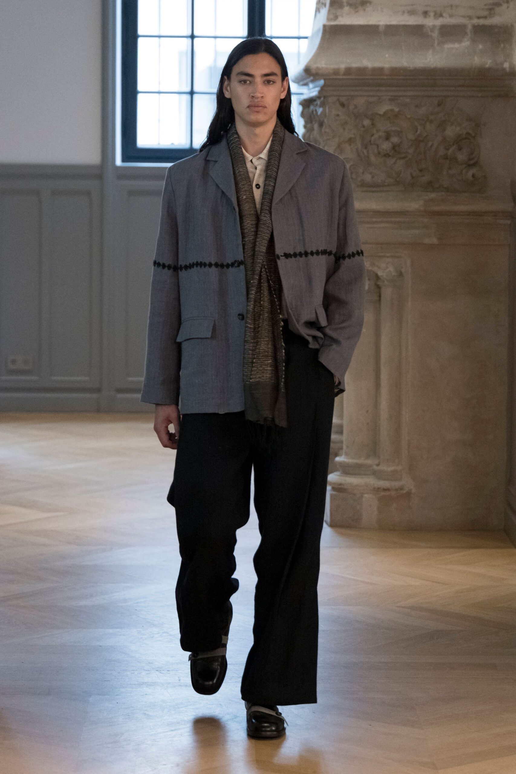 gray relaxed jacket with black pants