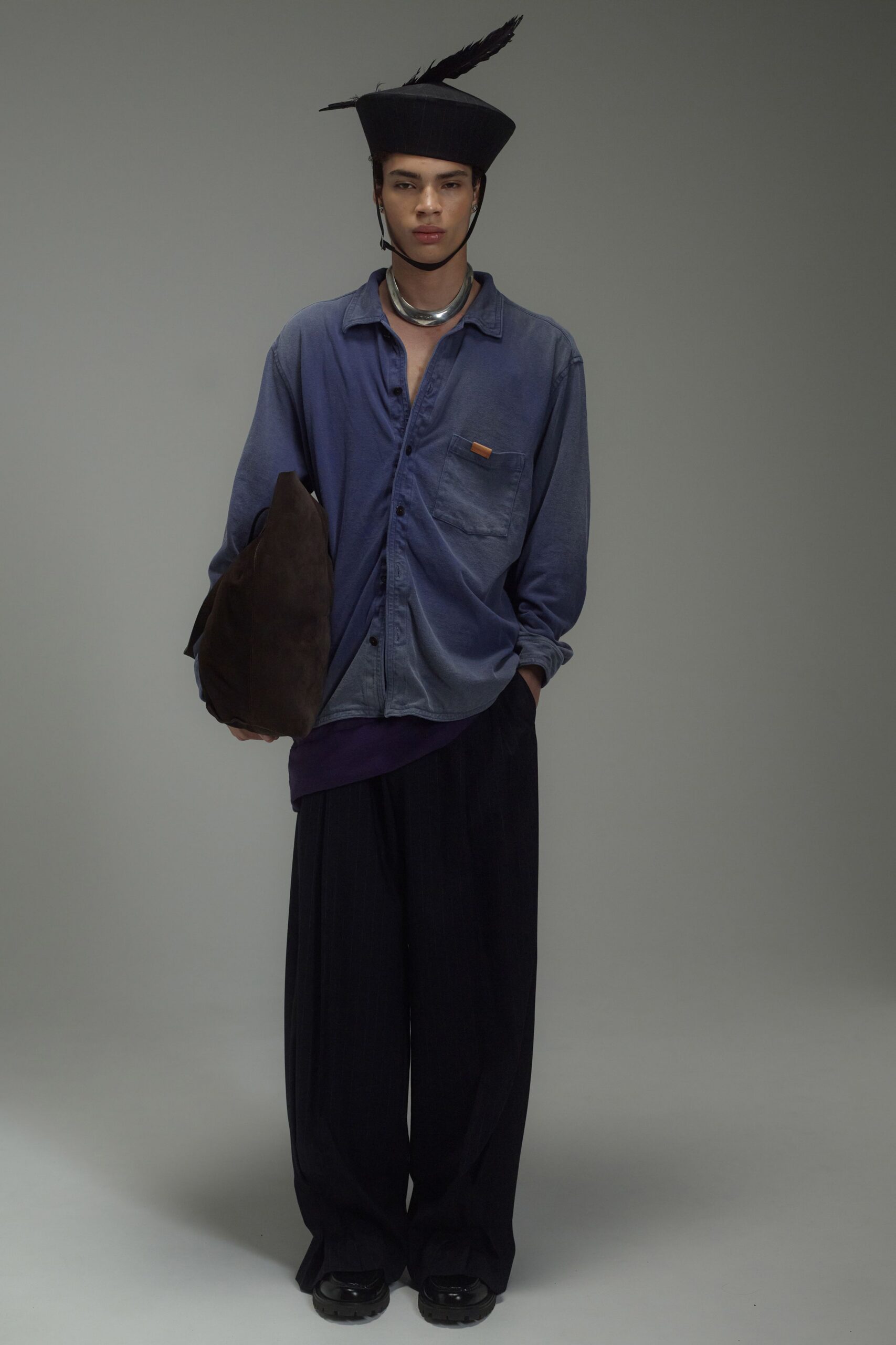 blue relaxed shirt with black pants