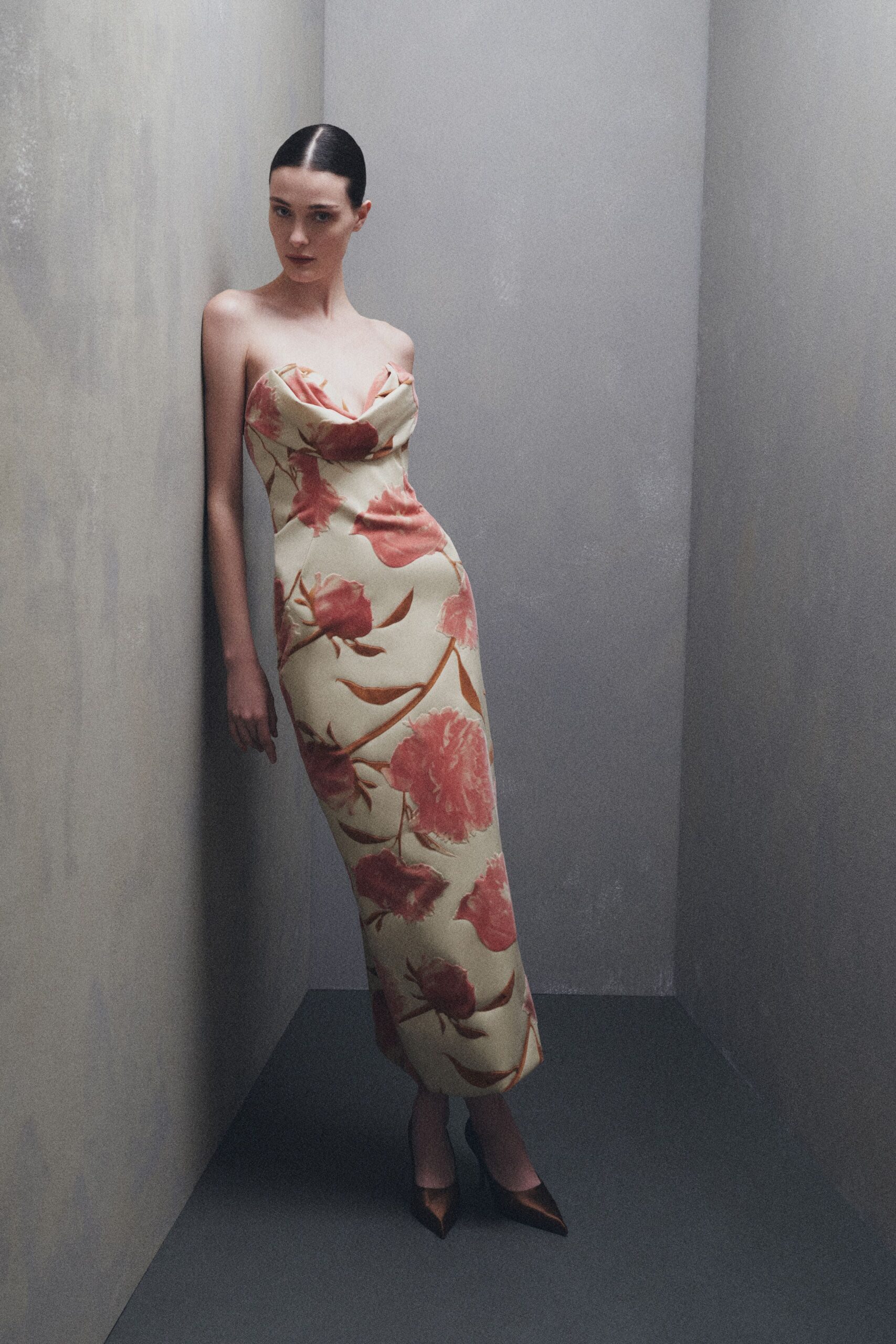 beige floral strapless gown with heels