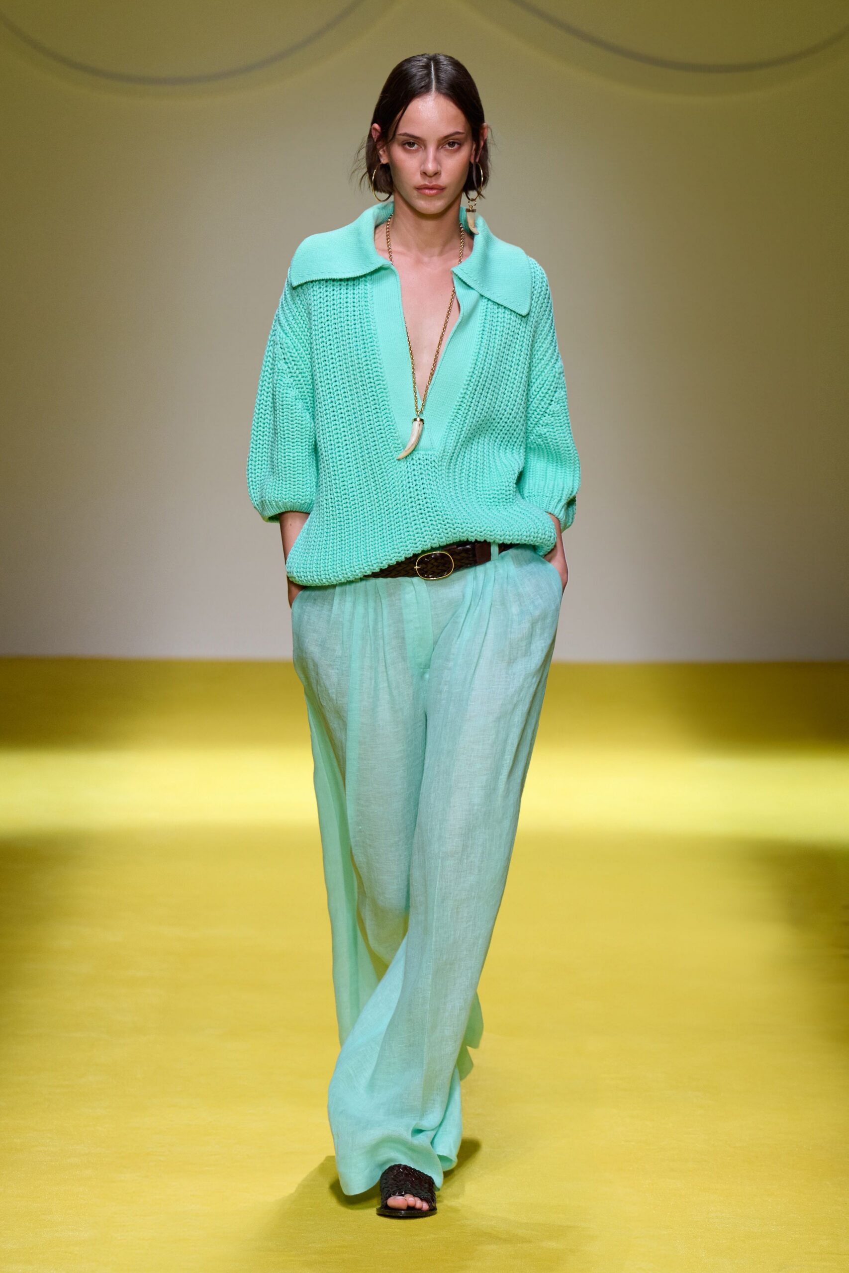 mint sweater and light green pants