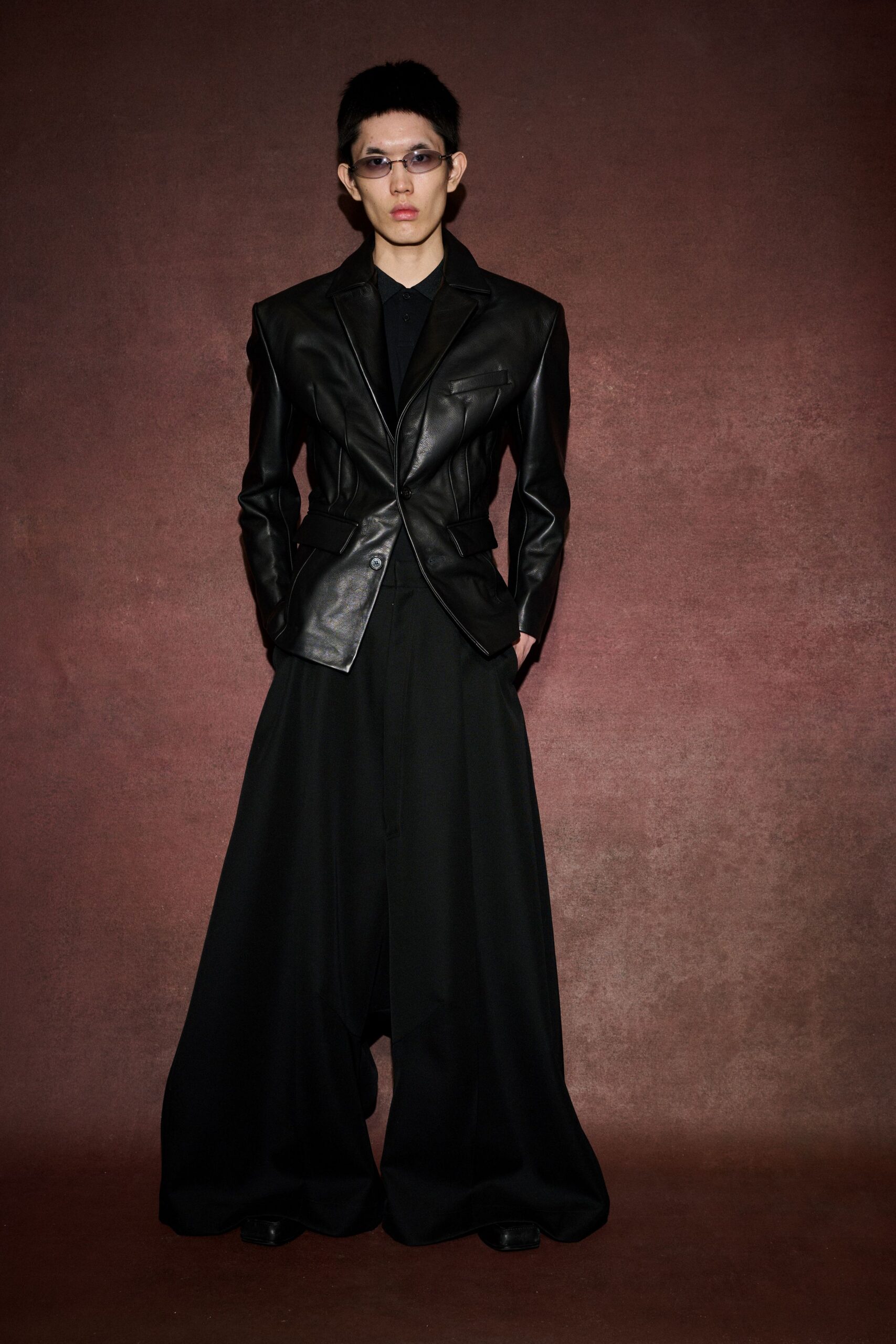 black leather blazer with wide-leg pants