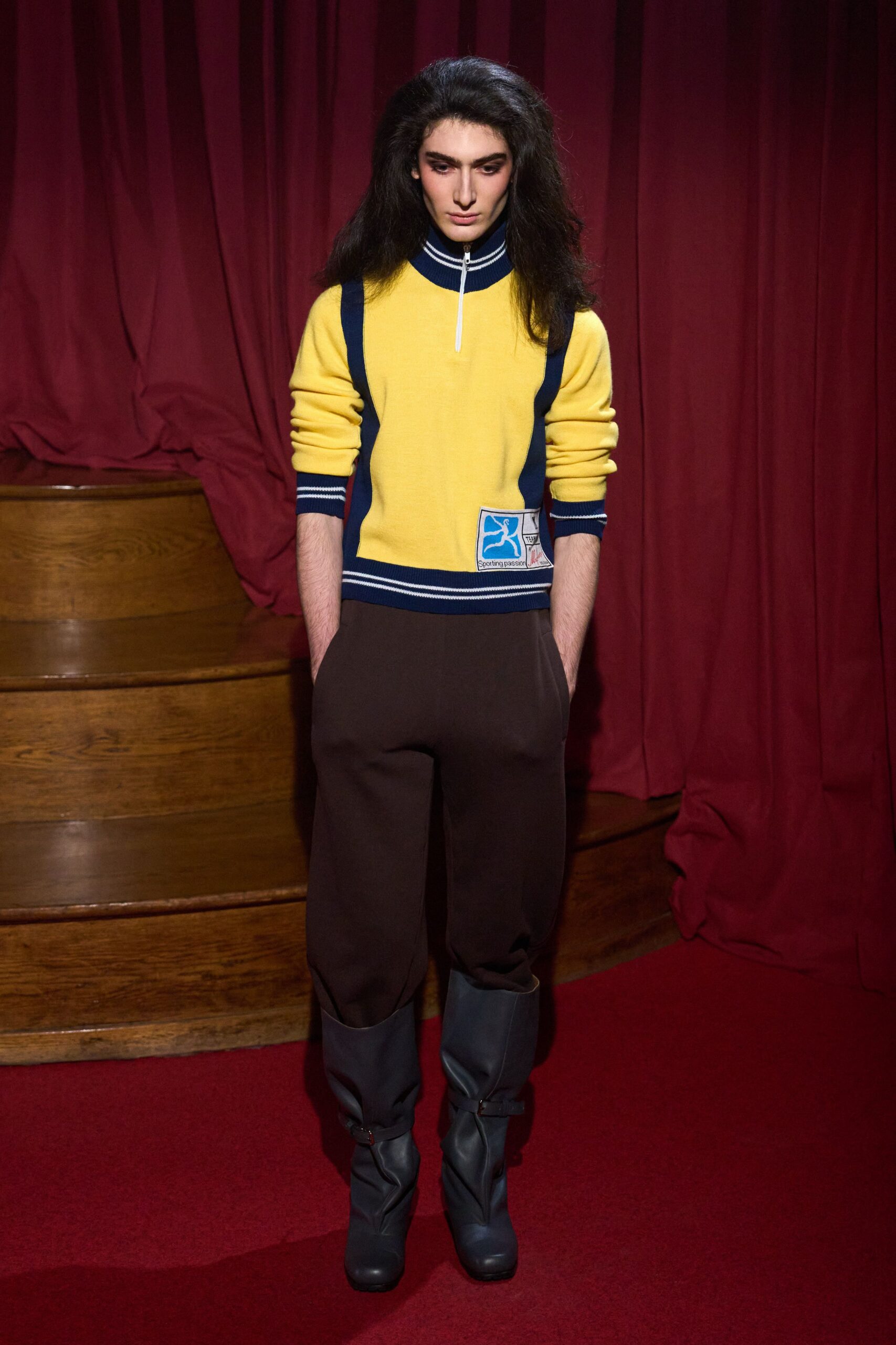 yellow fitted top brown pants black boots