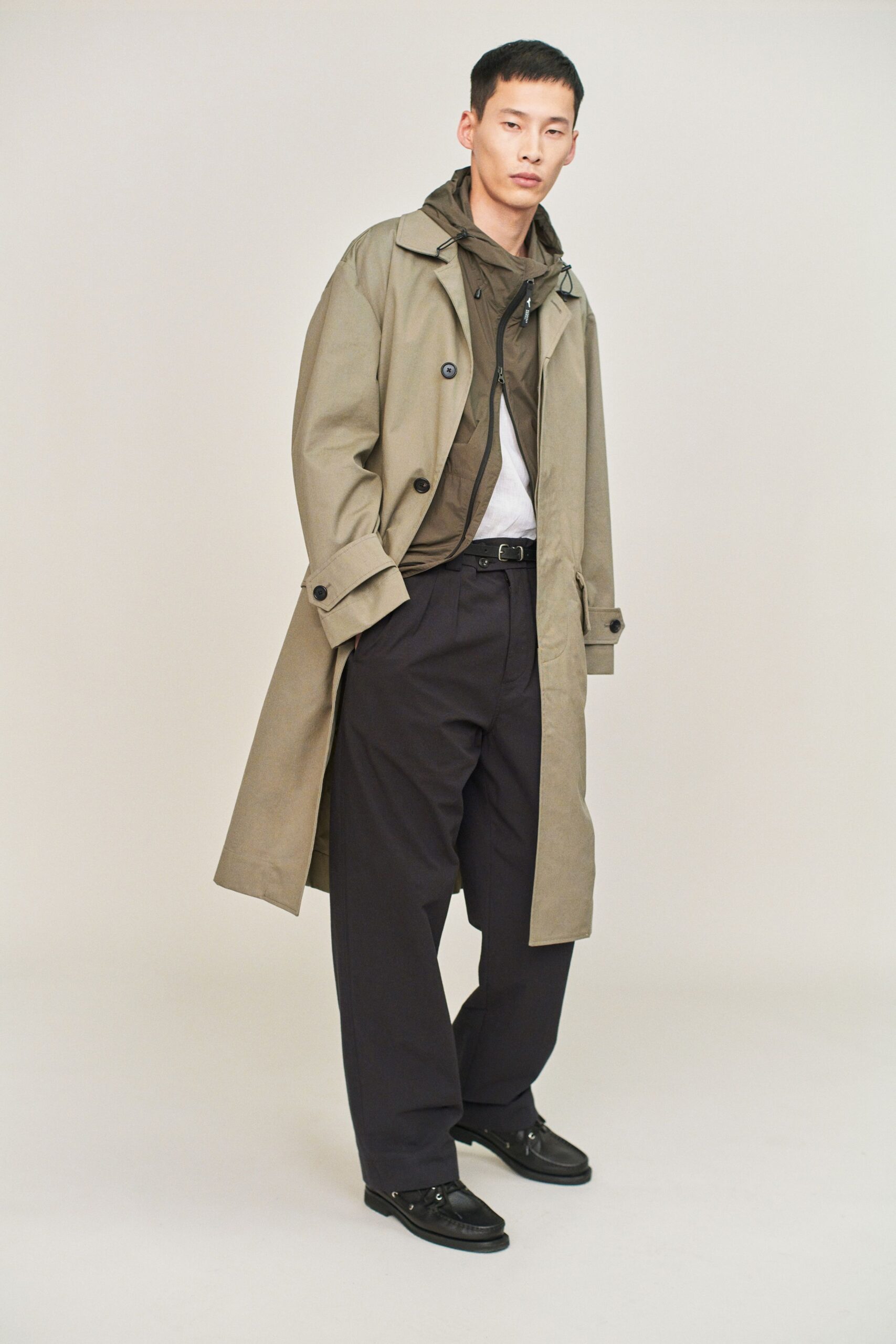 beige coat with black pants