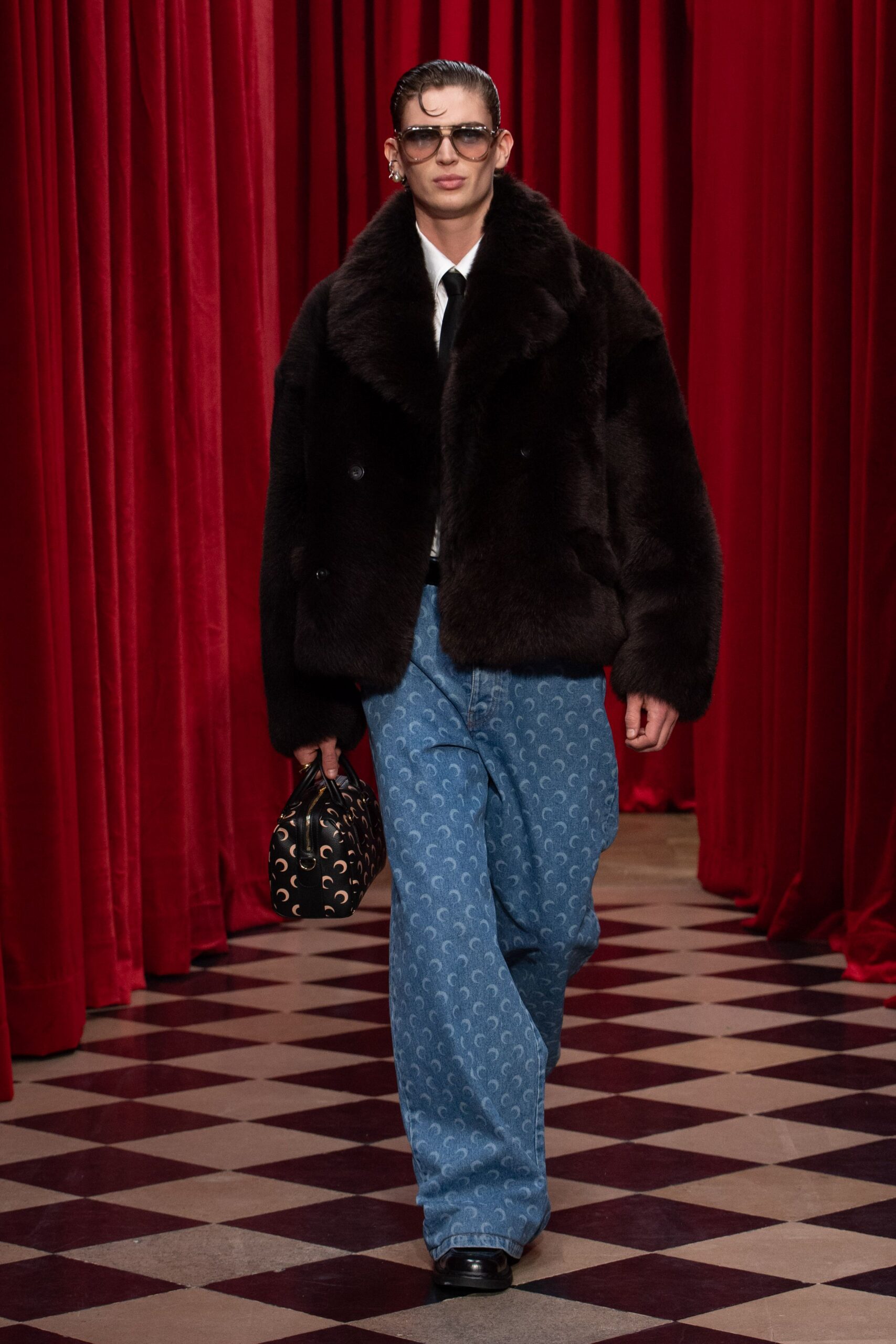brown faux-fur coat with blue denim pants