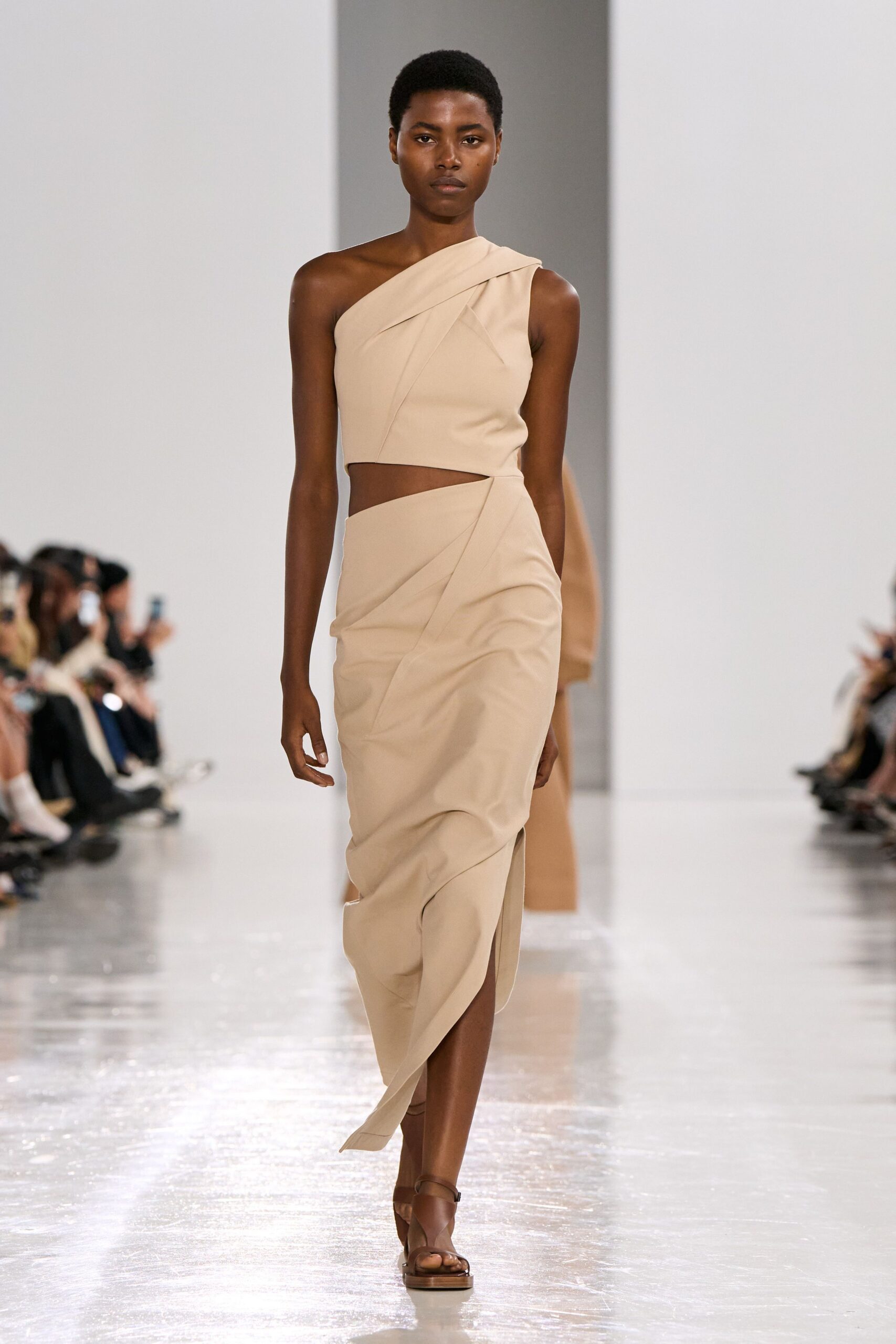 beige silk sleeveless asymmetric fitted draped midi dress