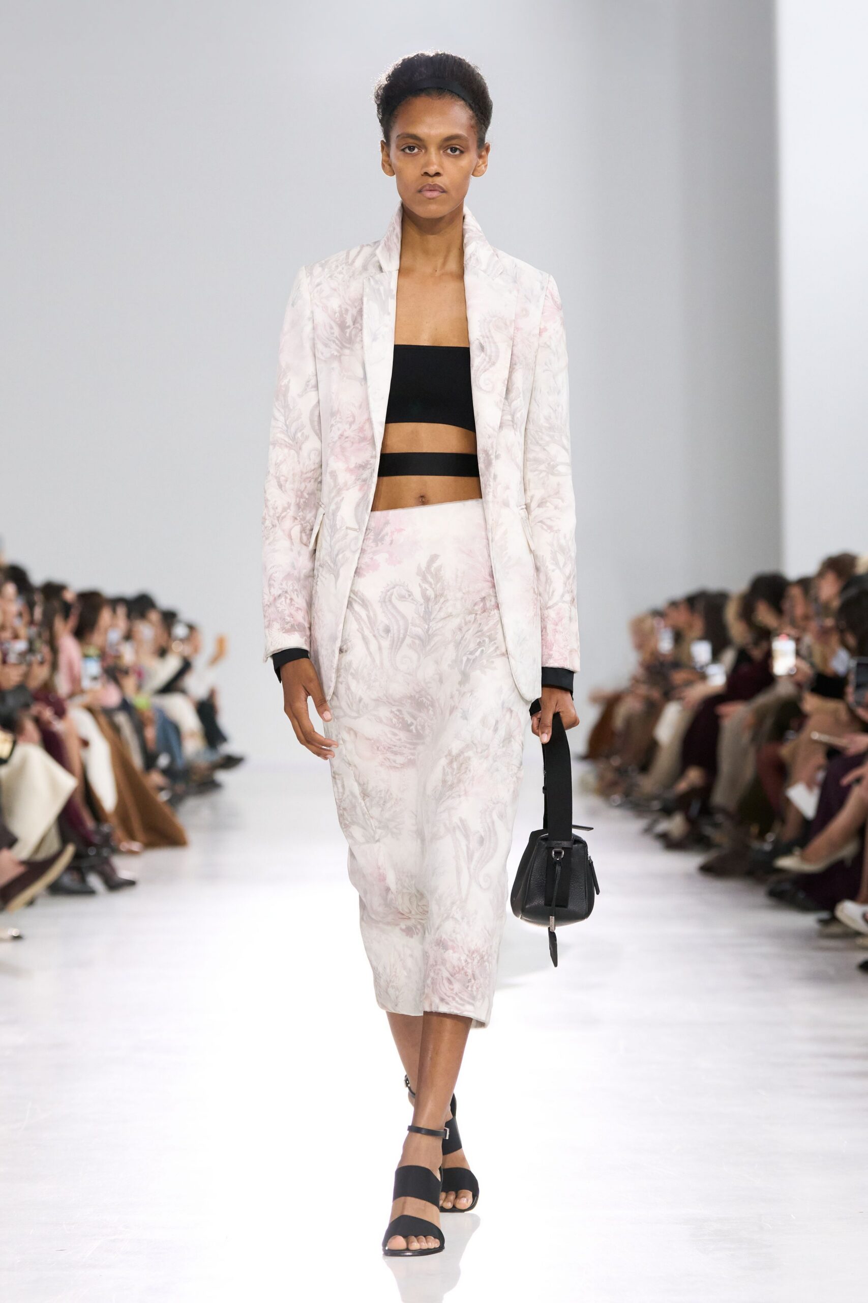 pink floral blazer with black top