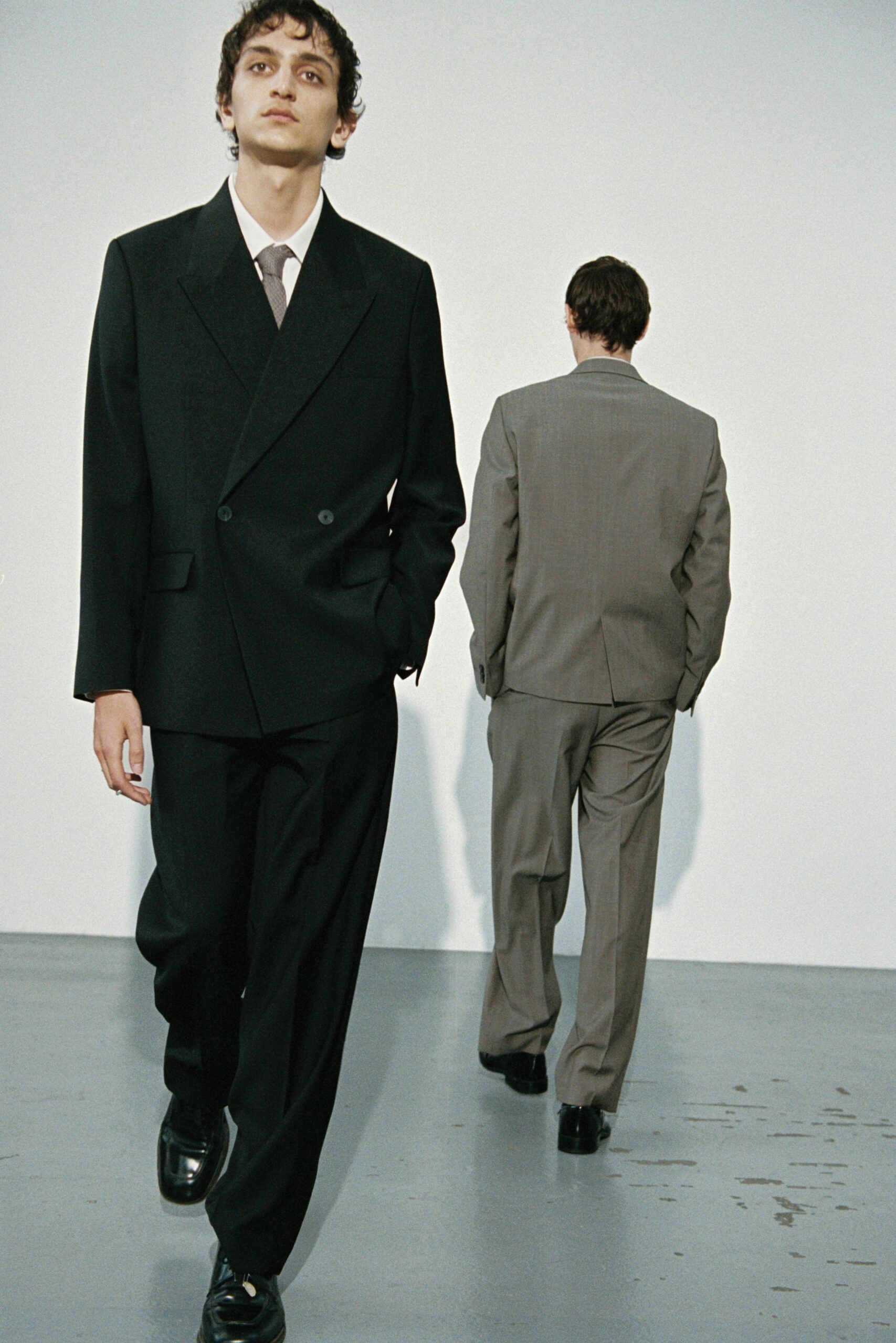 black and gray tailored suits