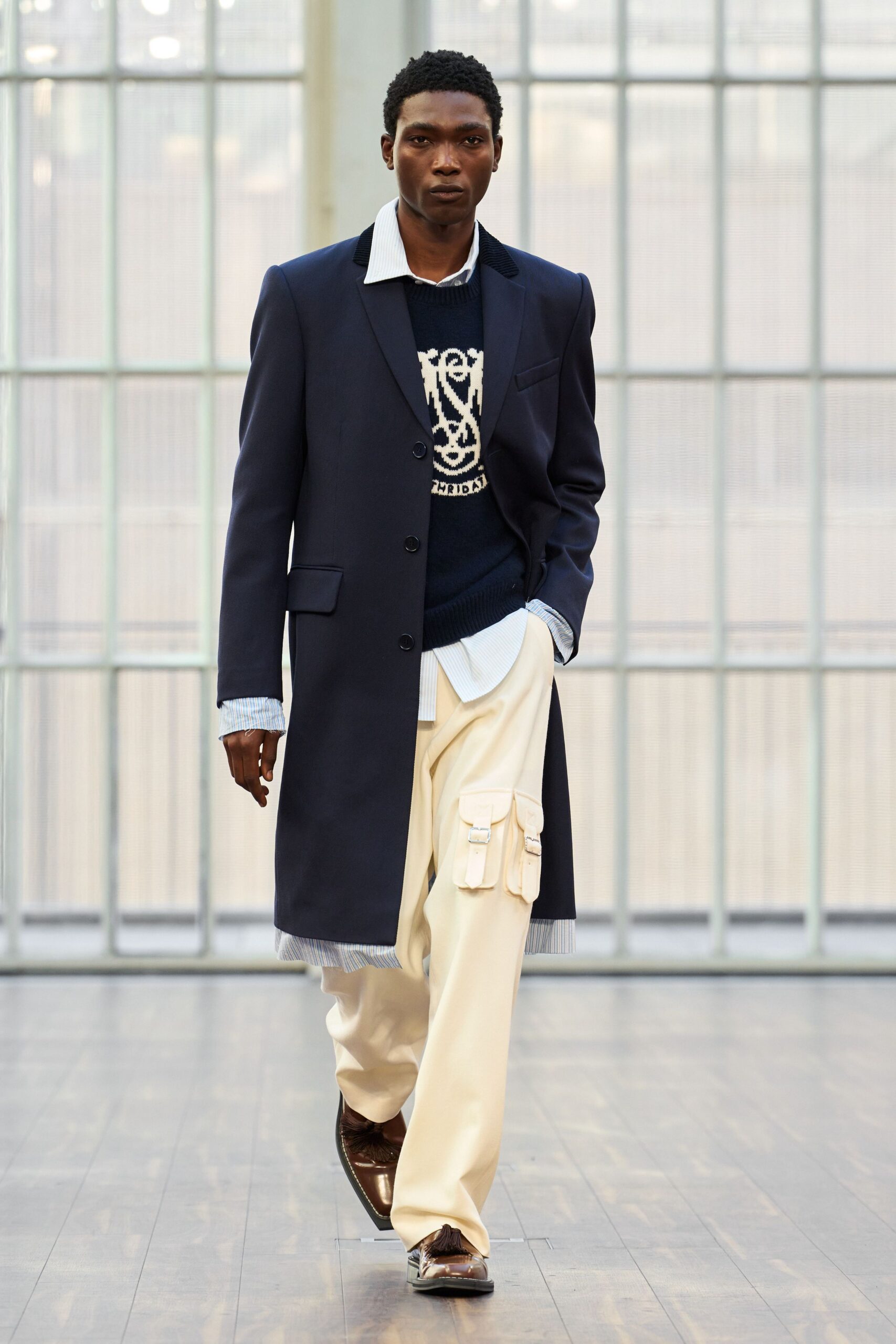 blue long-sleeve collared tailored coat