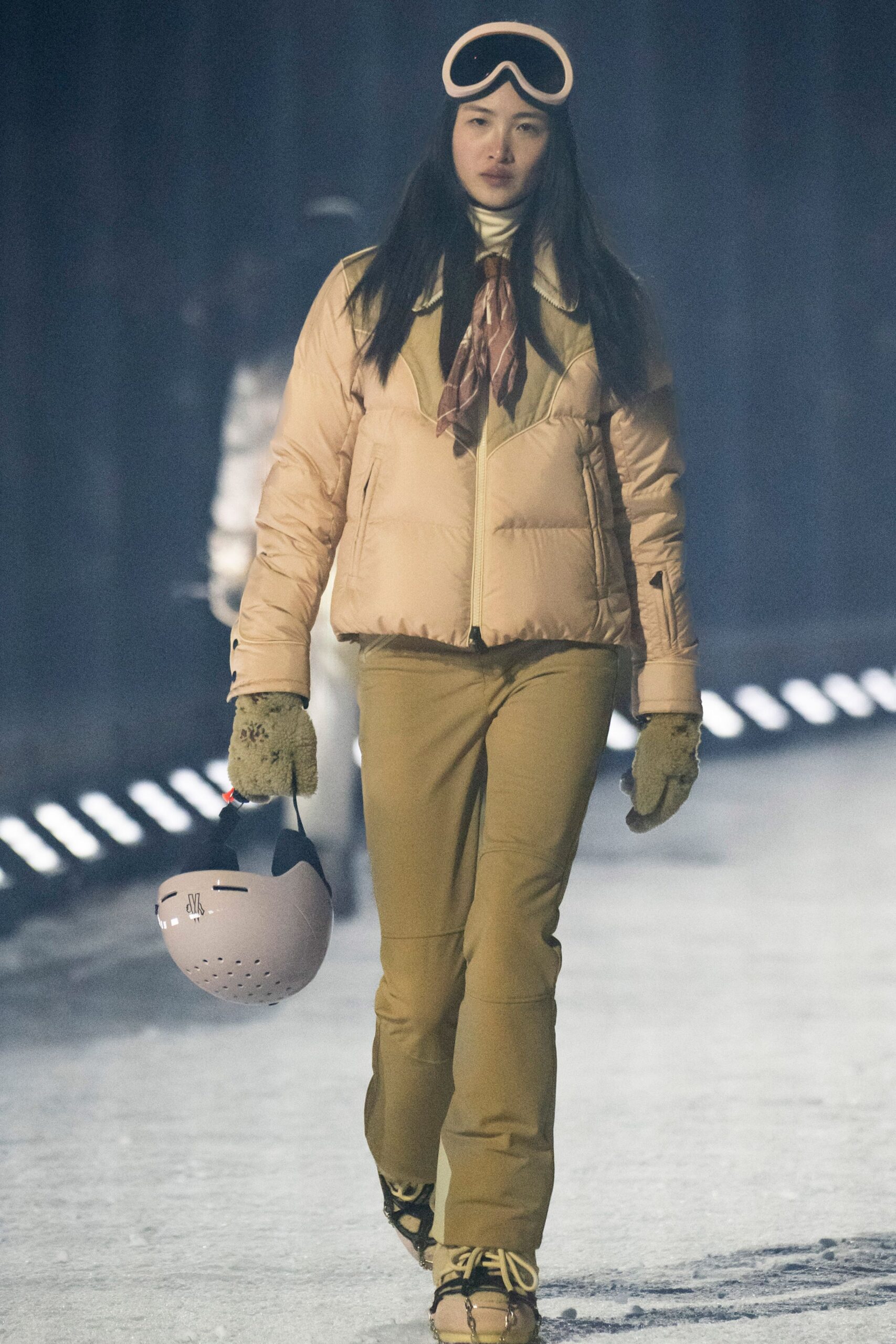 beige padded jacket with brown pants