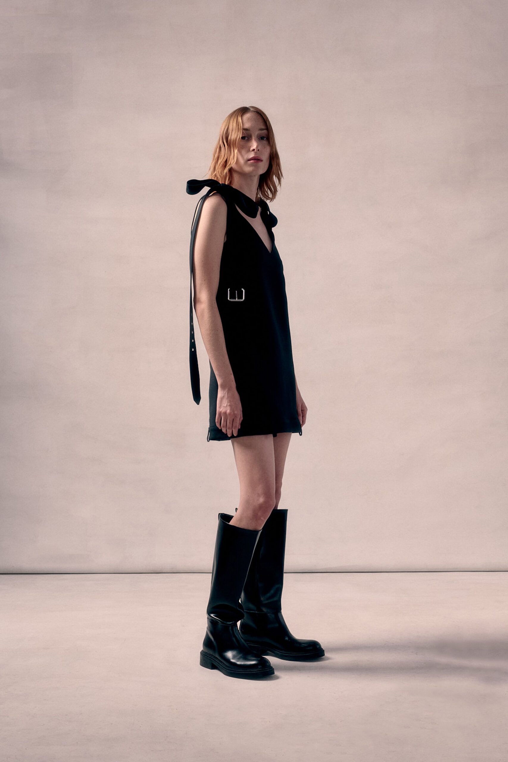 black cotton sleeveless v-neck fitted draped mini dress