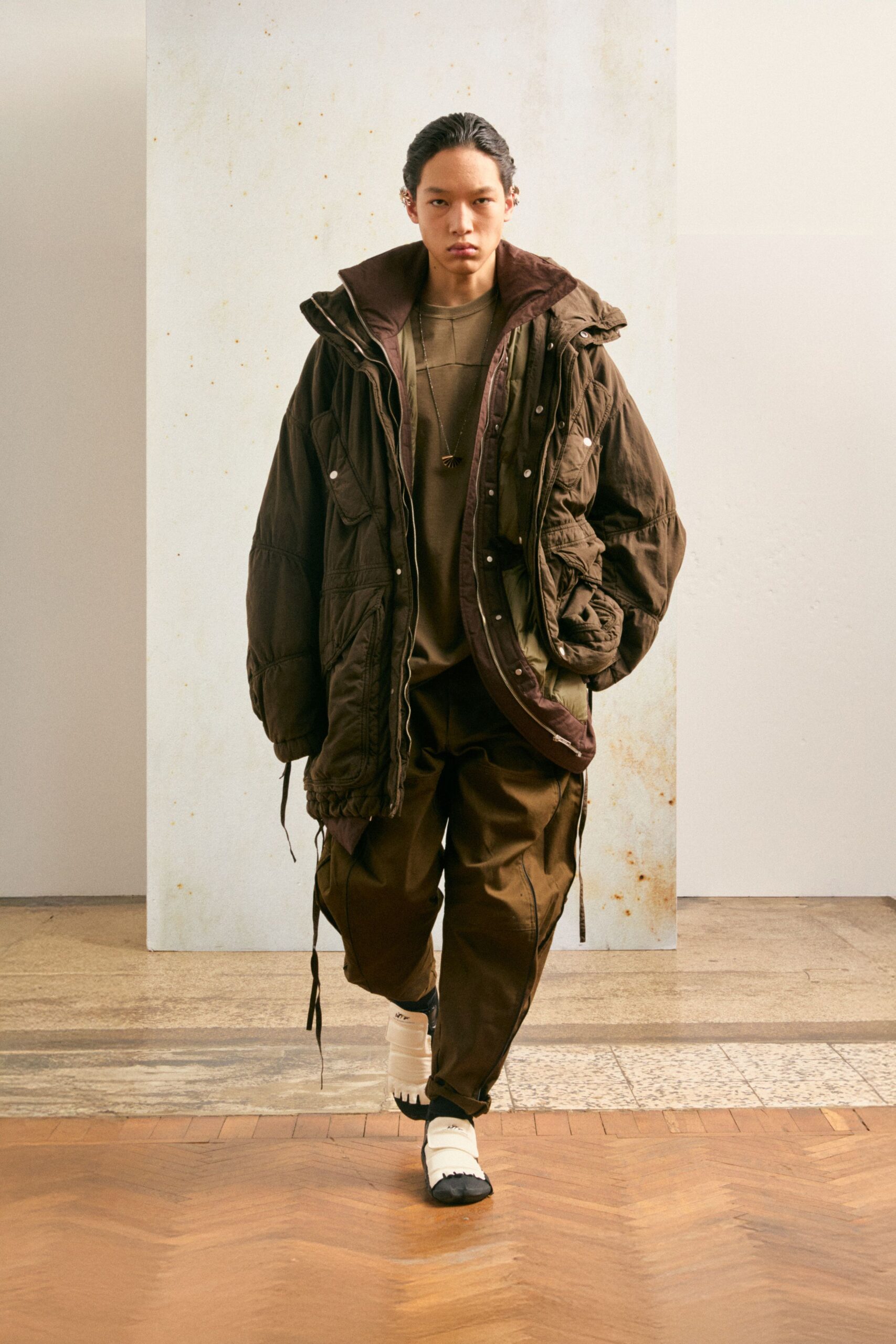 brown relaxed coat with white shoes