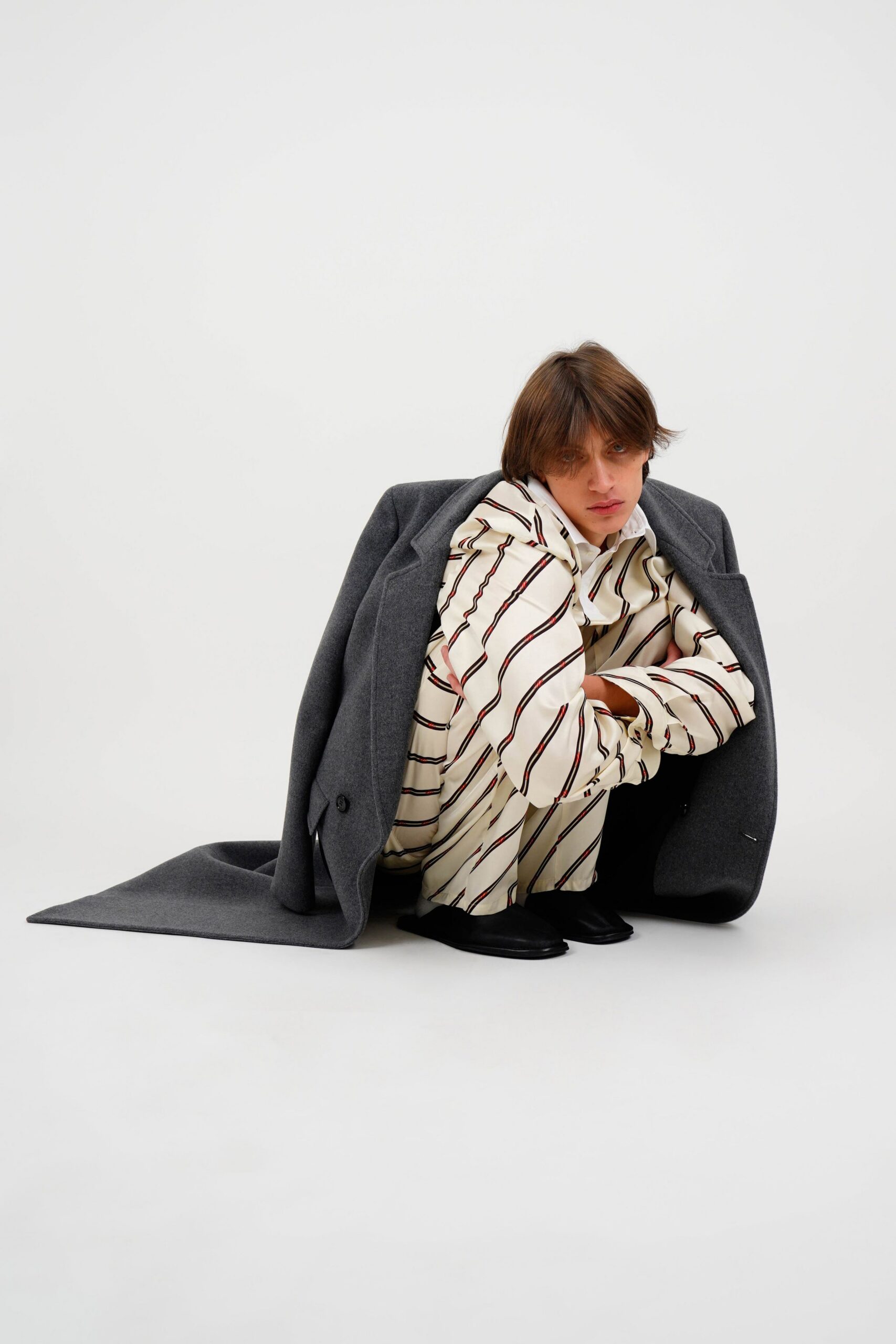 gray wool coat with striped shirt