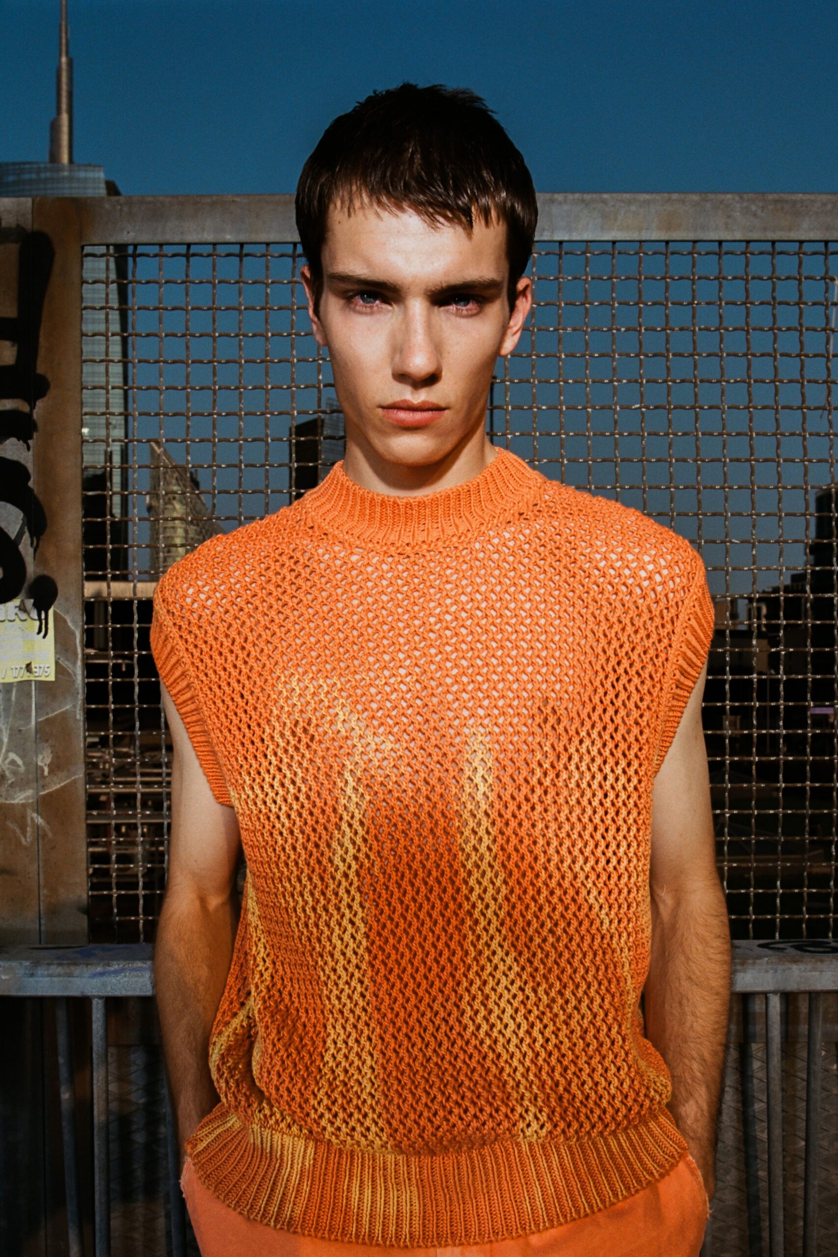 orange knit sleeveless high-neck fitted textured sheer top
