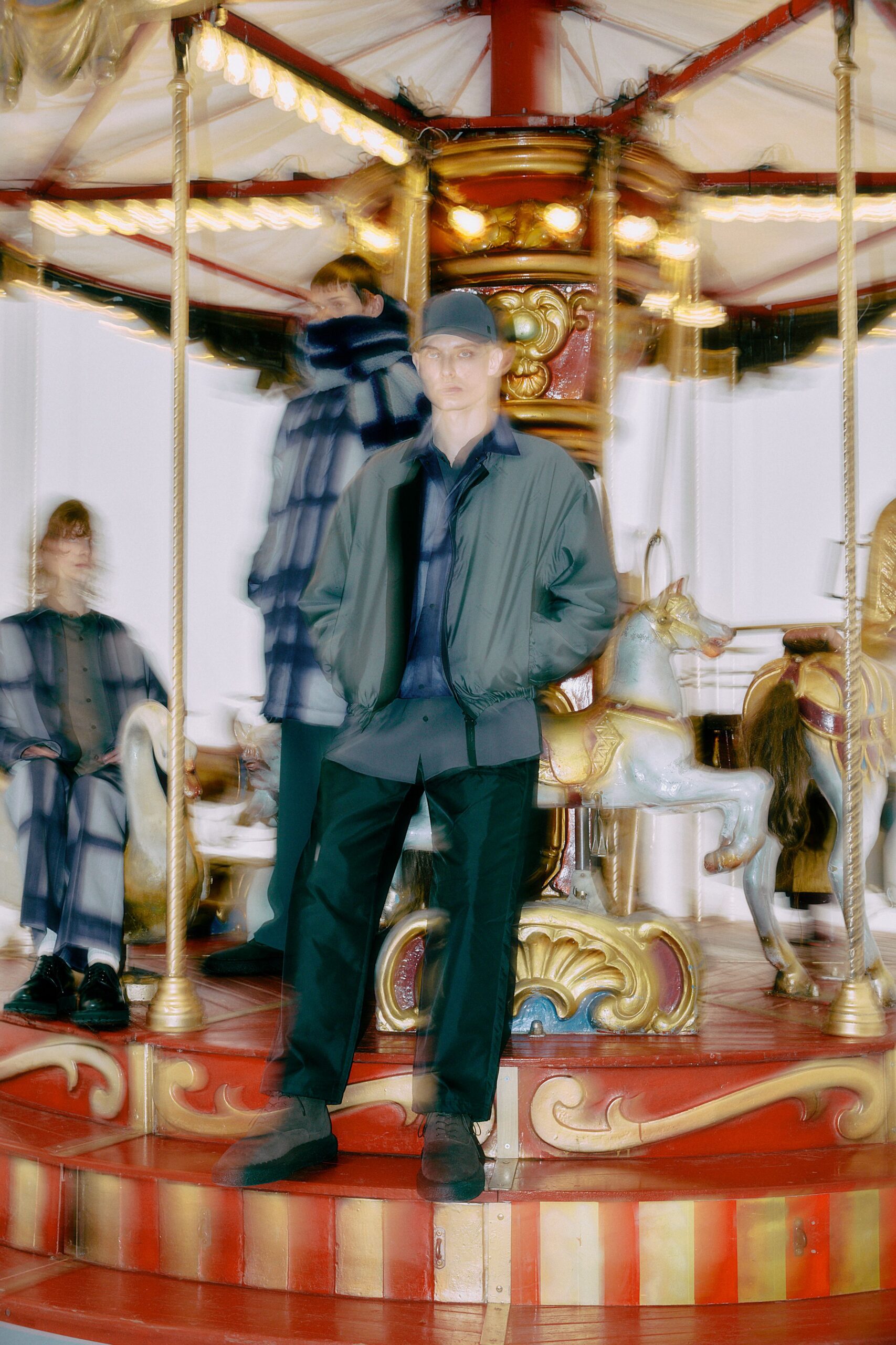 green relaxed jacket with blue shirt