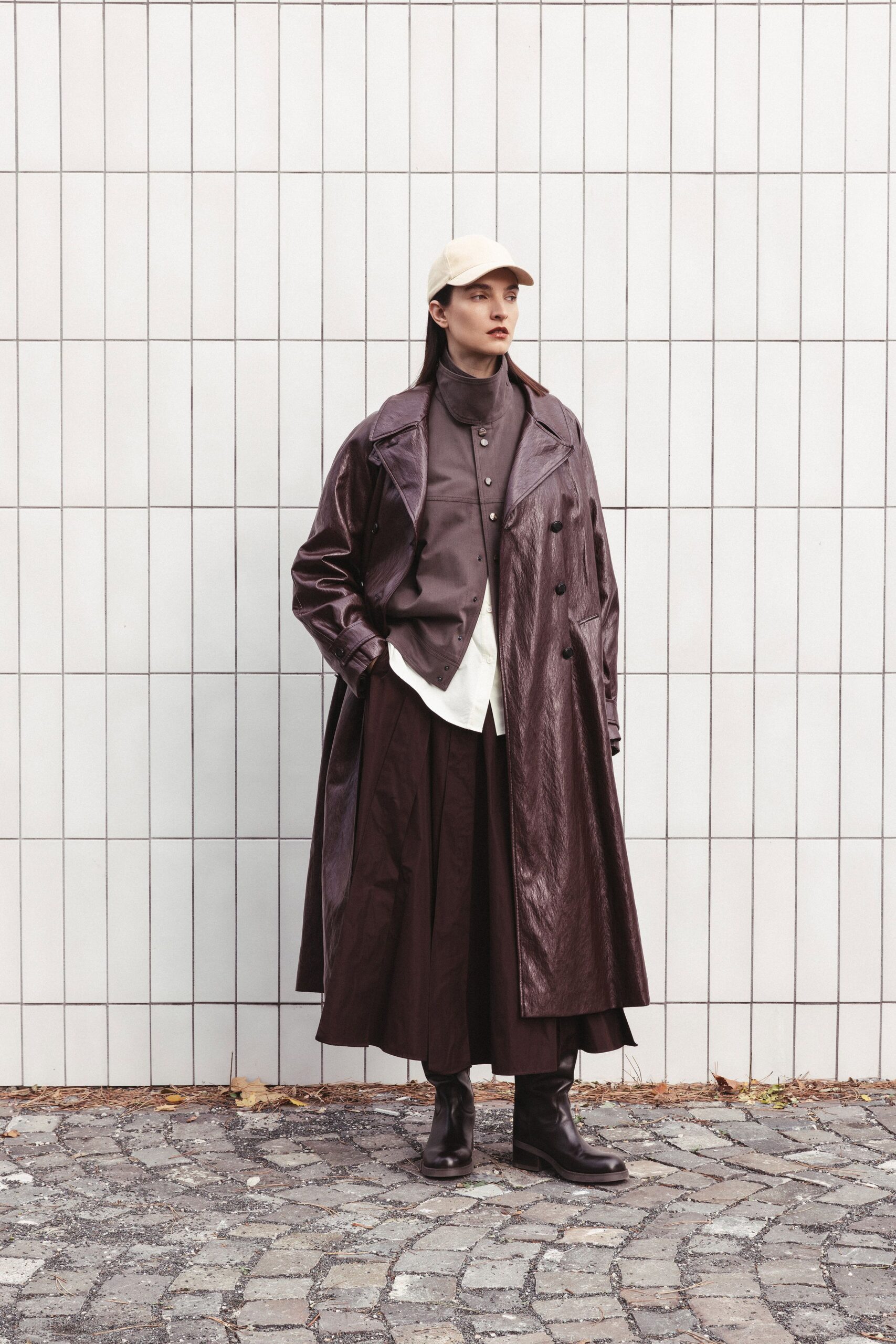 brown leather long-sleeve collared relaxed buttoned draped coat
