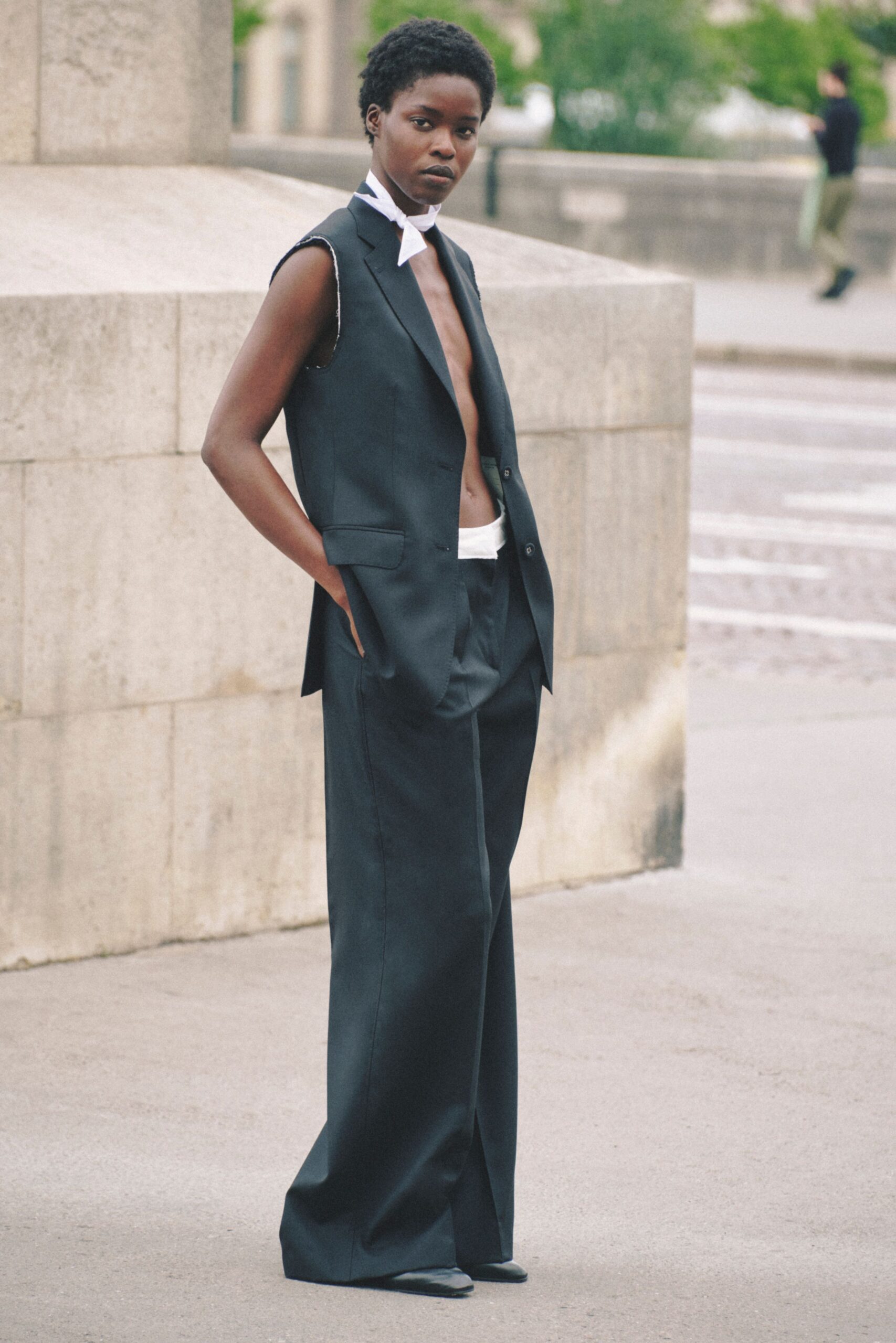 black structured vest and tailored pants